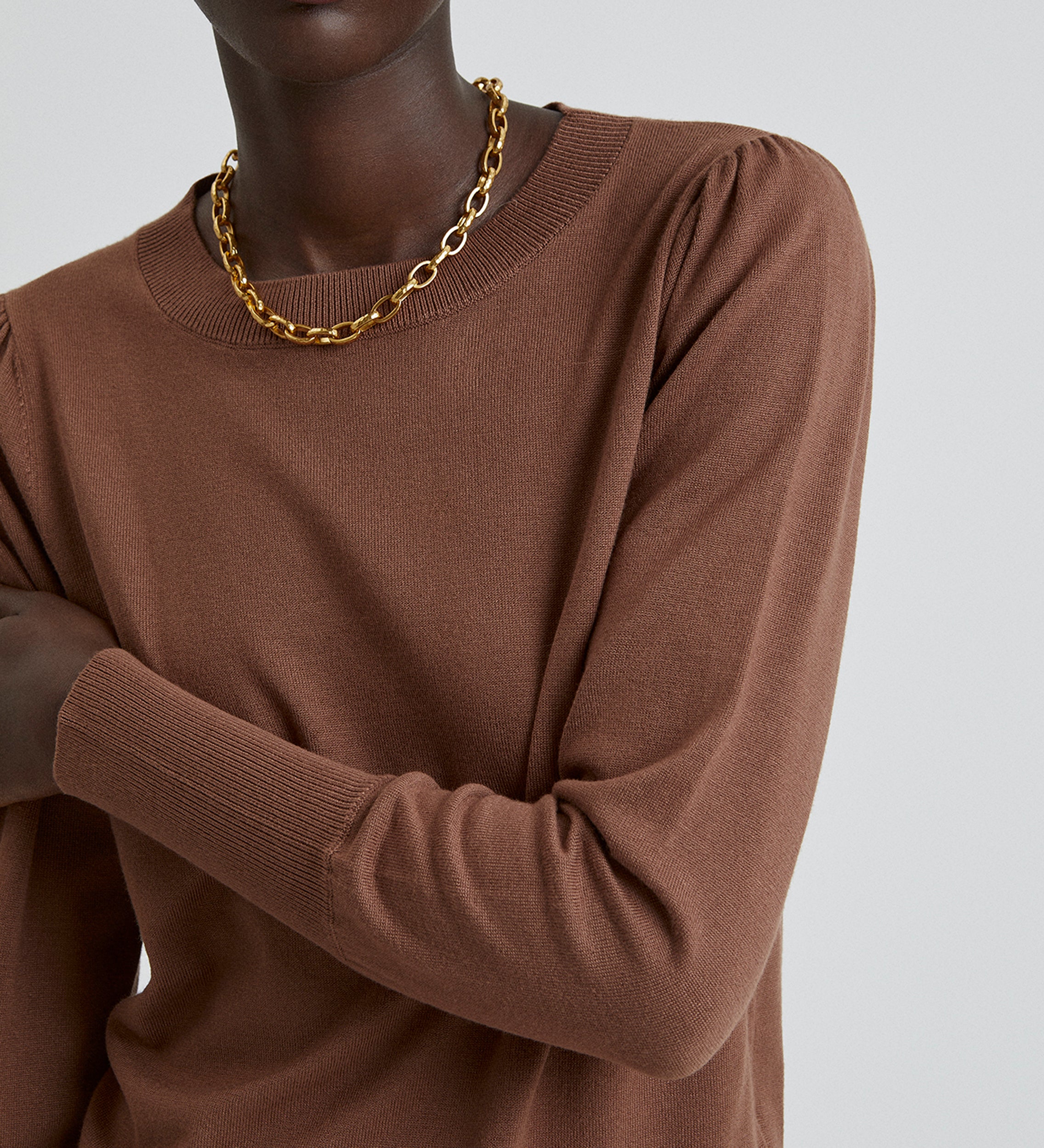 Gathered sleeve sweater