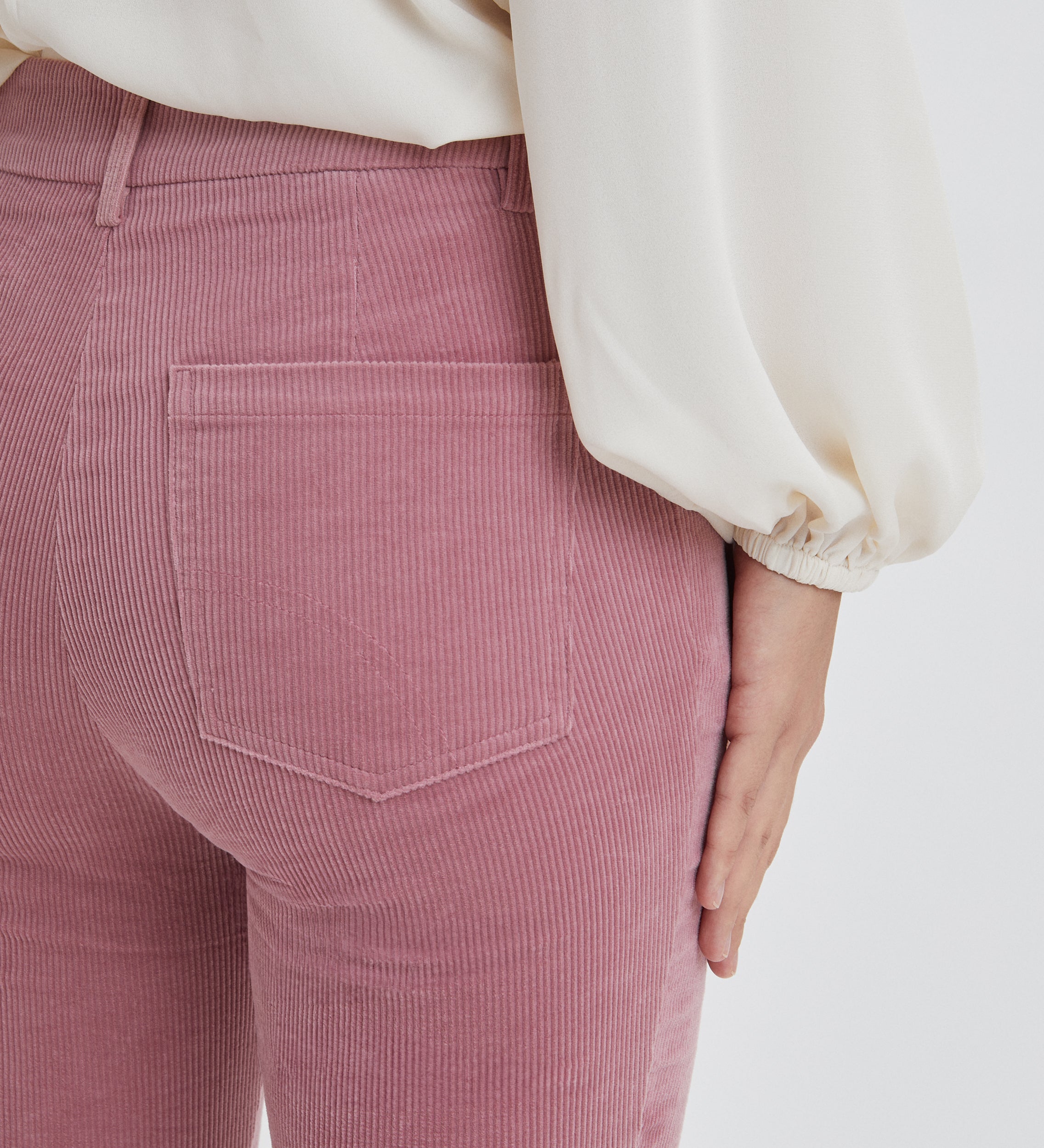 Flared elastic trousers