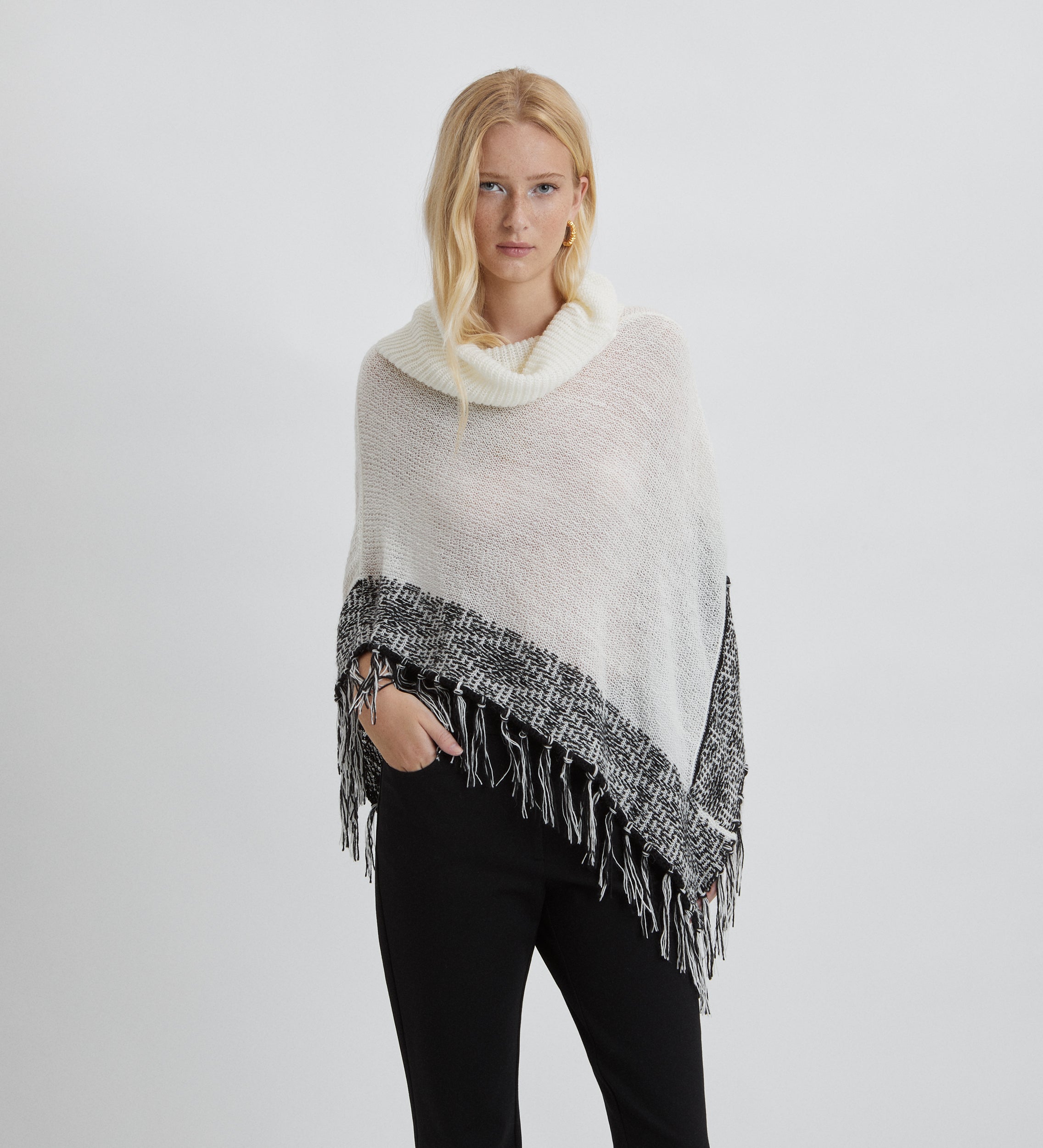 Fringe knit poncho