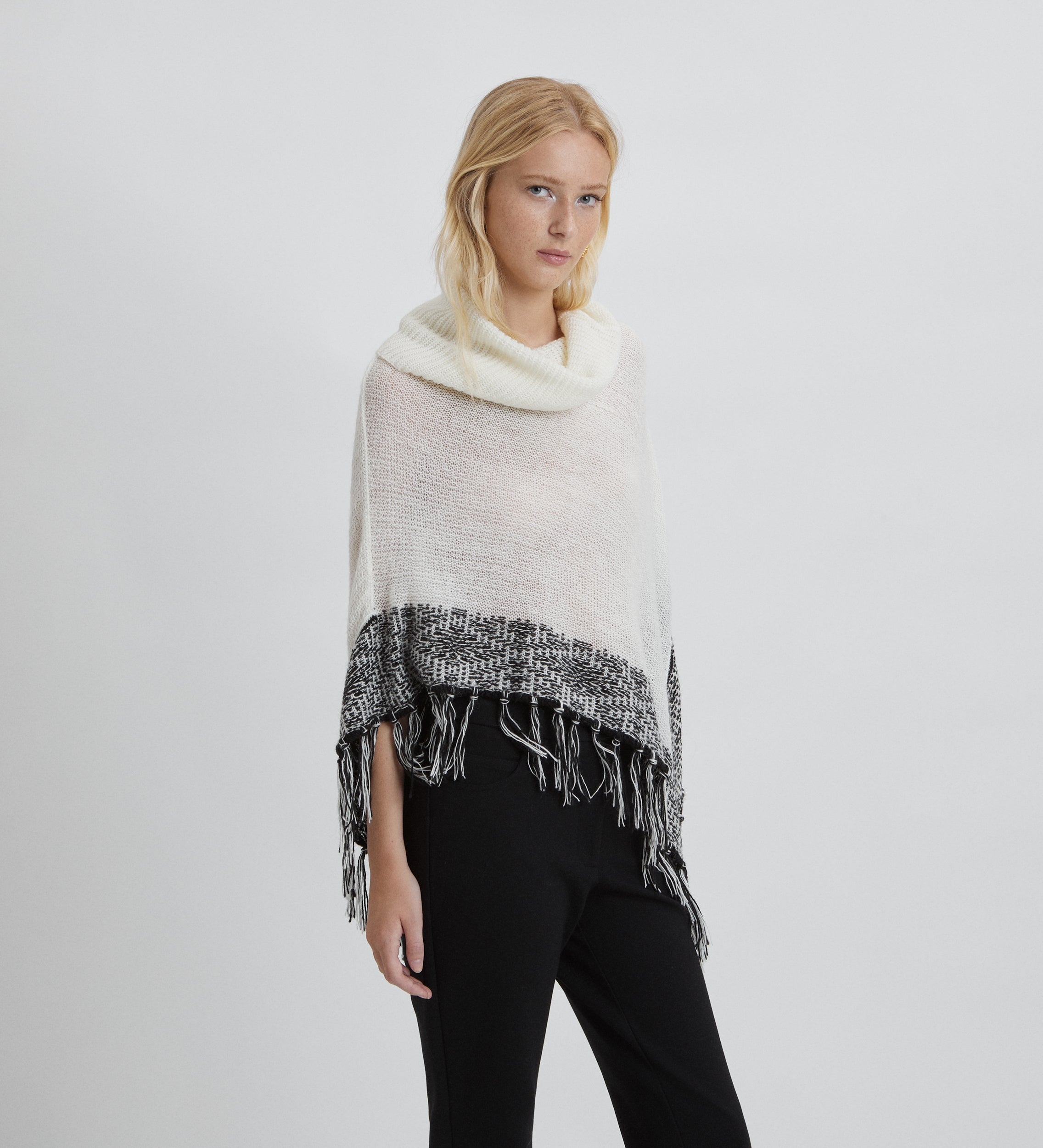 Fringe knit poncho