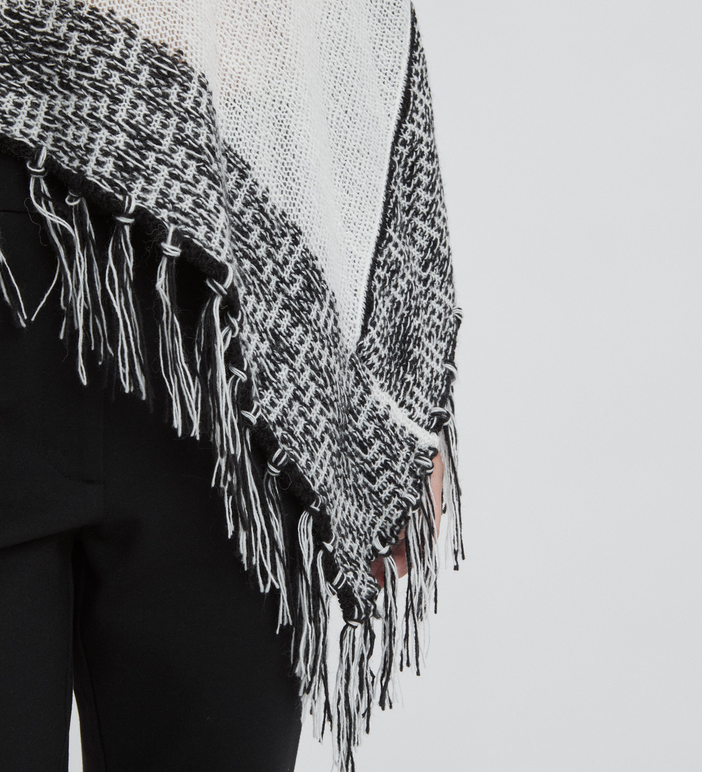 Fringe knit poncho