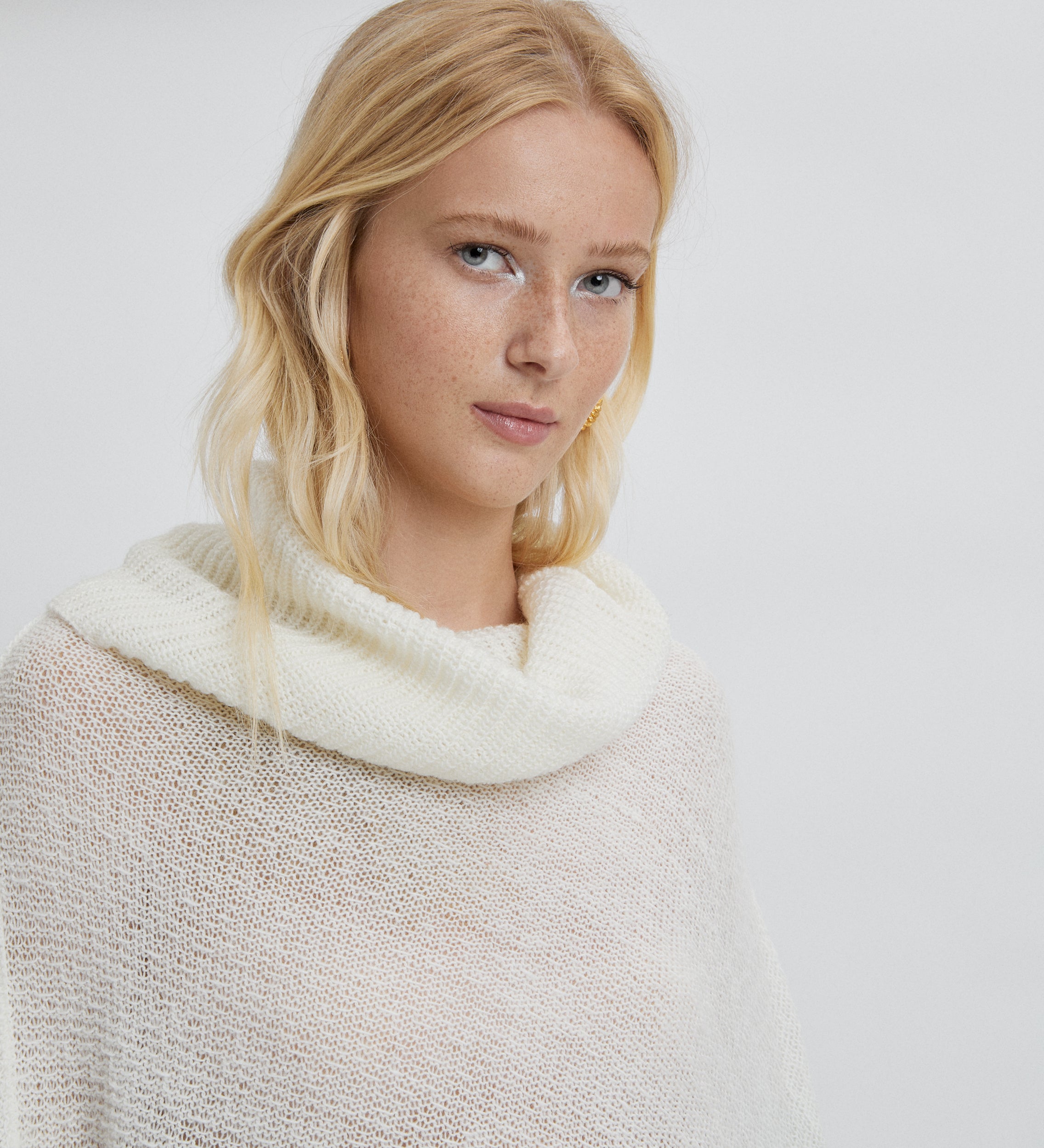 Fringe knit poncho