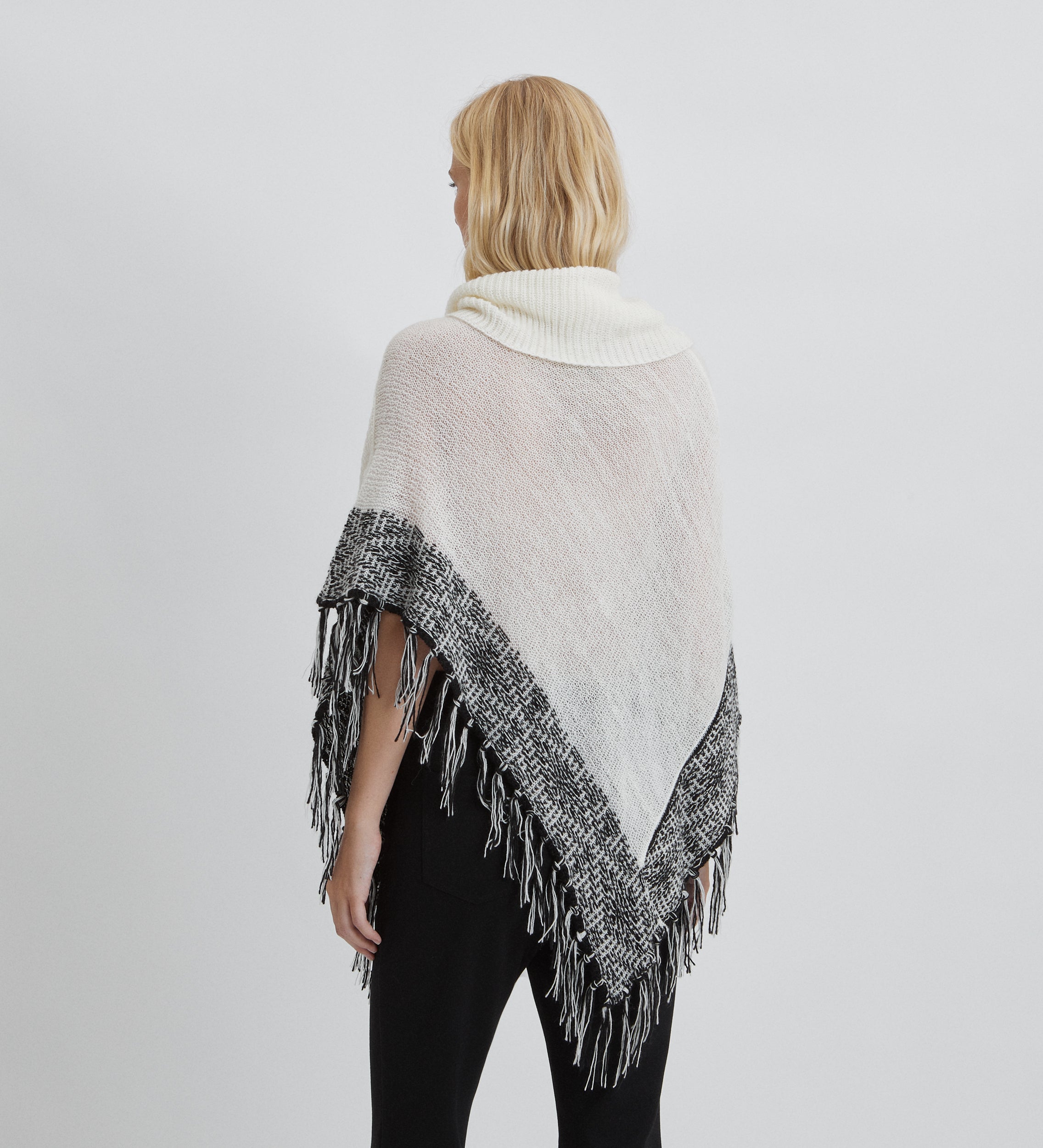 Fringe knit poncho