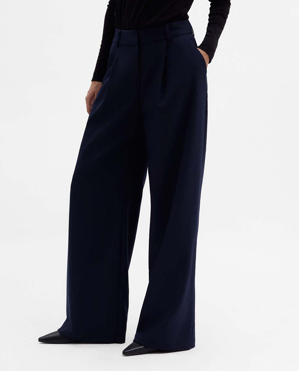 Wide pleated trousers