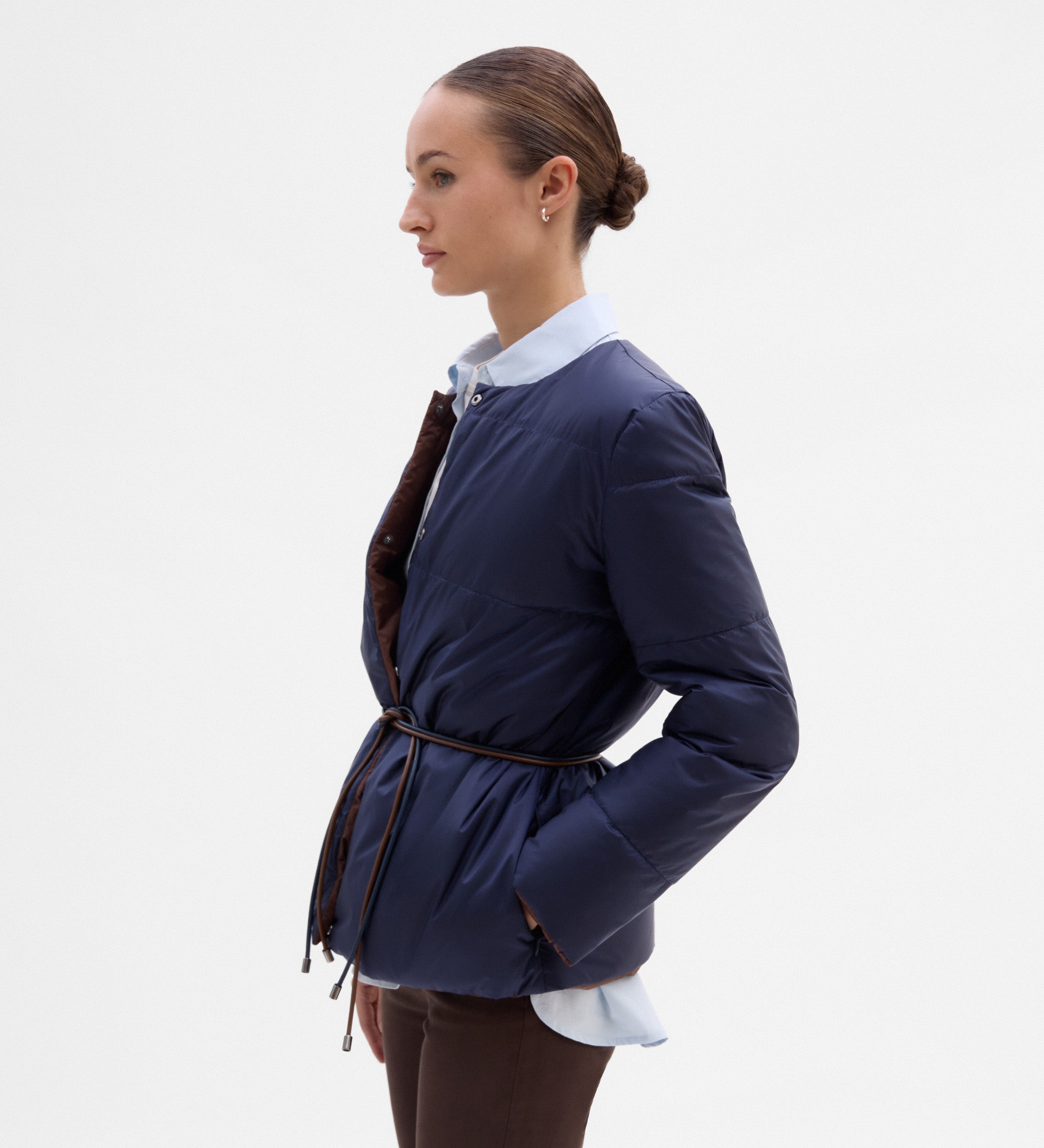 Plumífero reversible cinturón