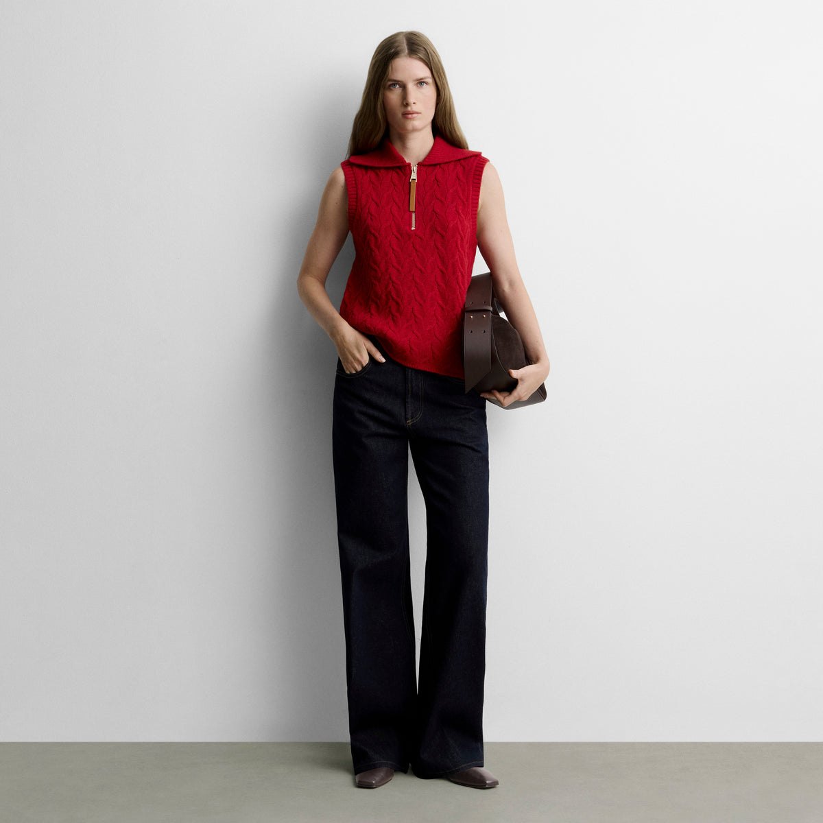 Knitted vest with braids