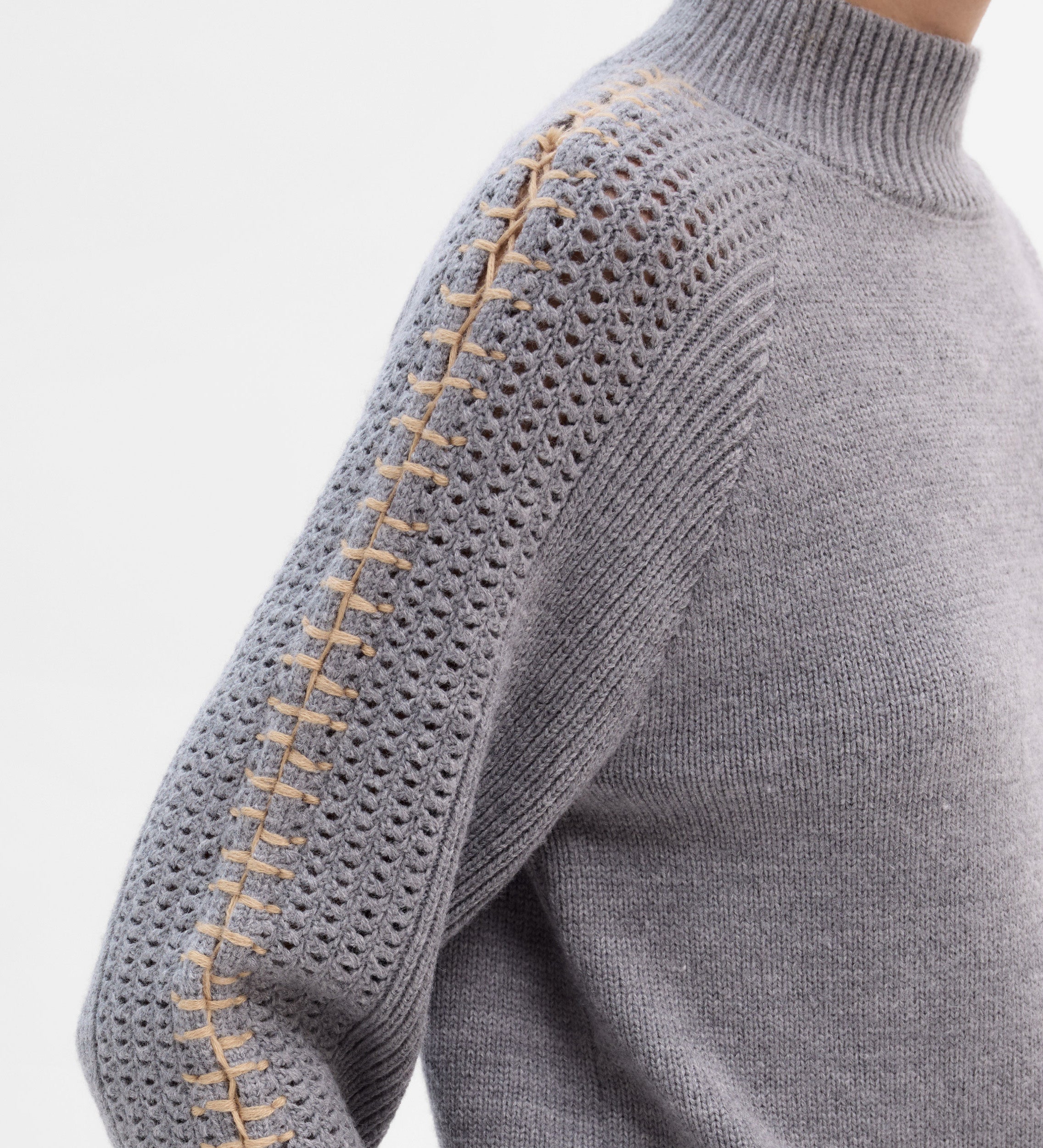 Knit sweater with contrast stitching