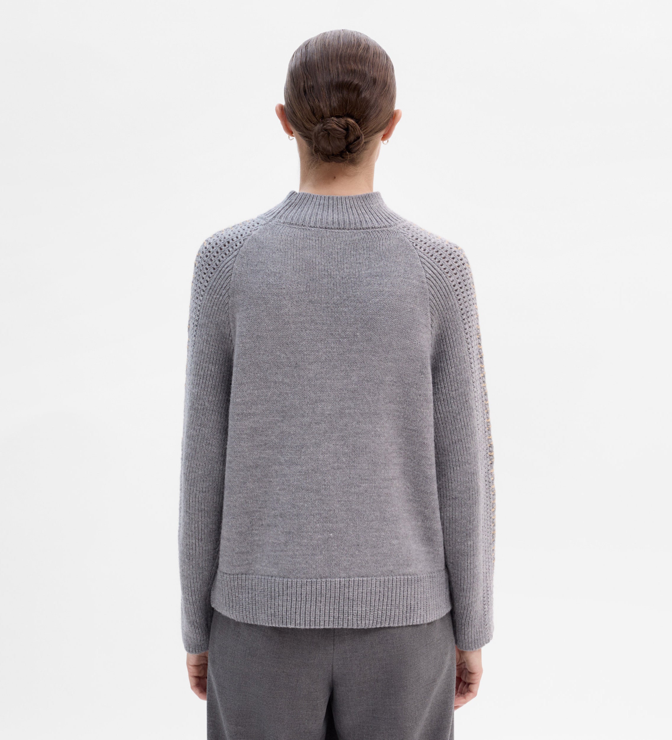 Knit sweater with contrast stitching