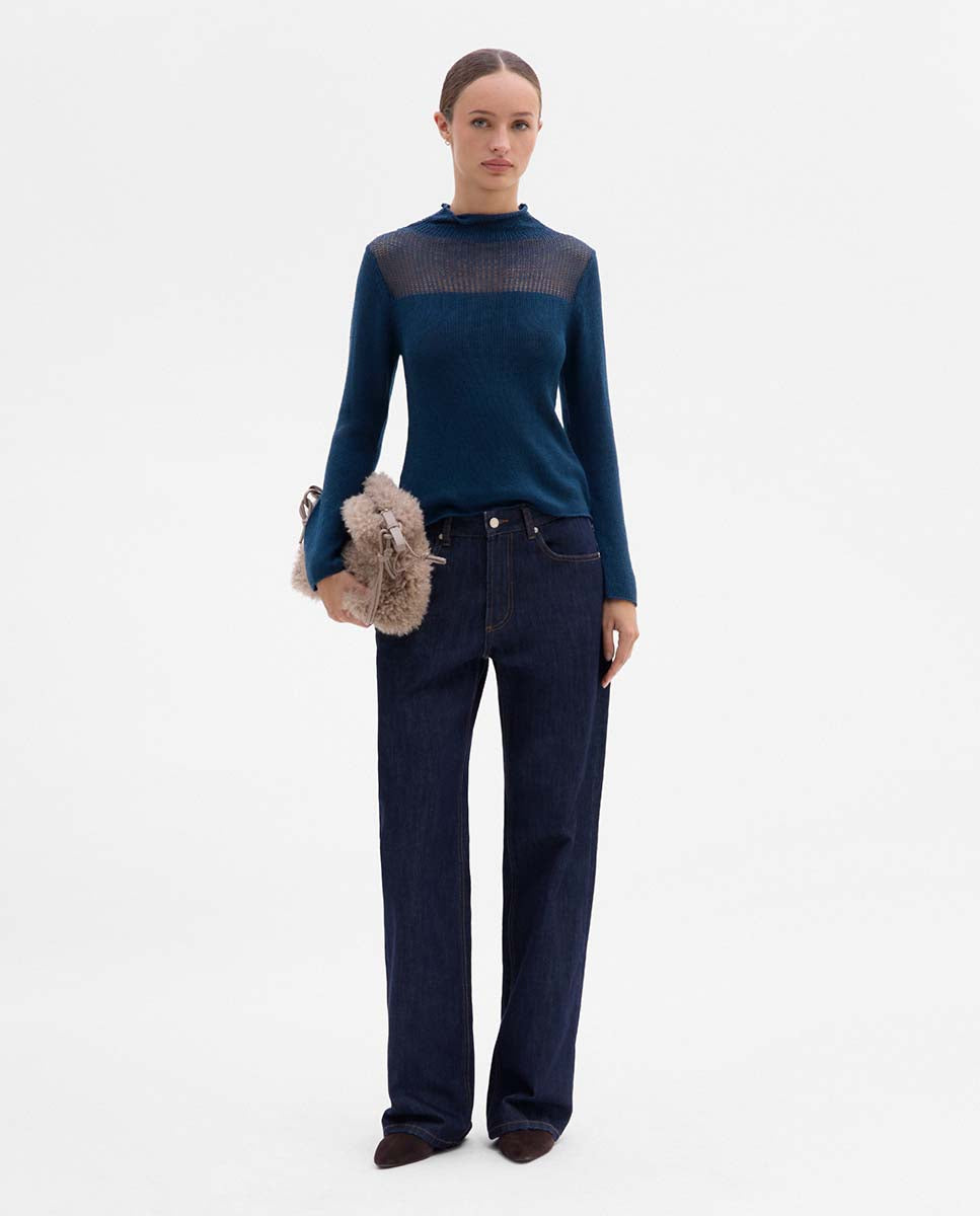 Sweater with unstitched detail