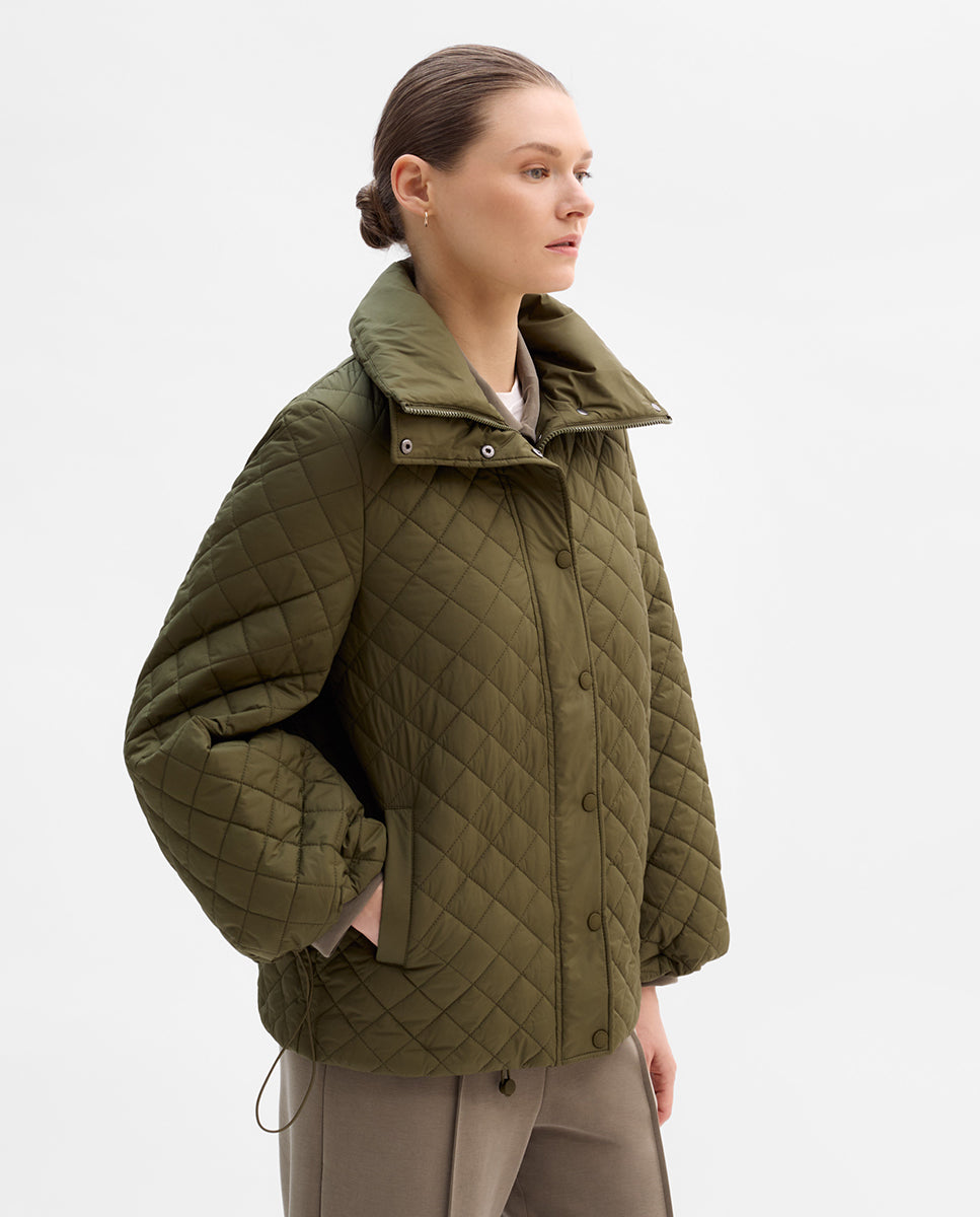 Parka acolchada doble cuello