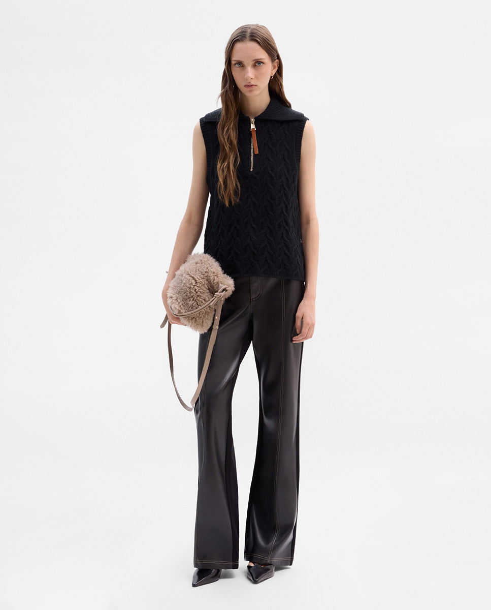 Bi-material trousers with stitching