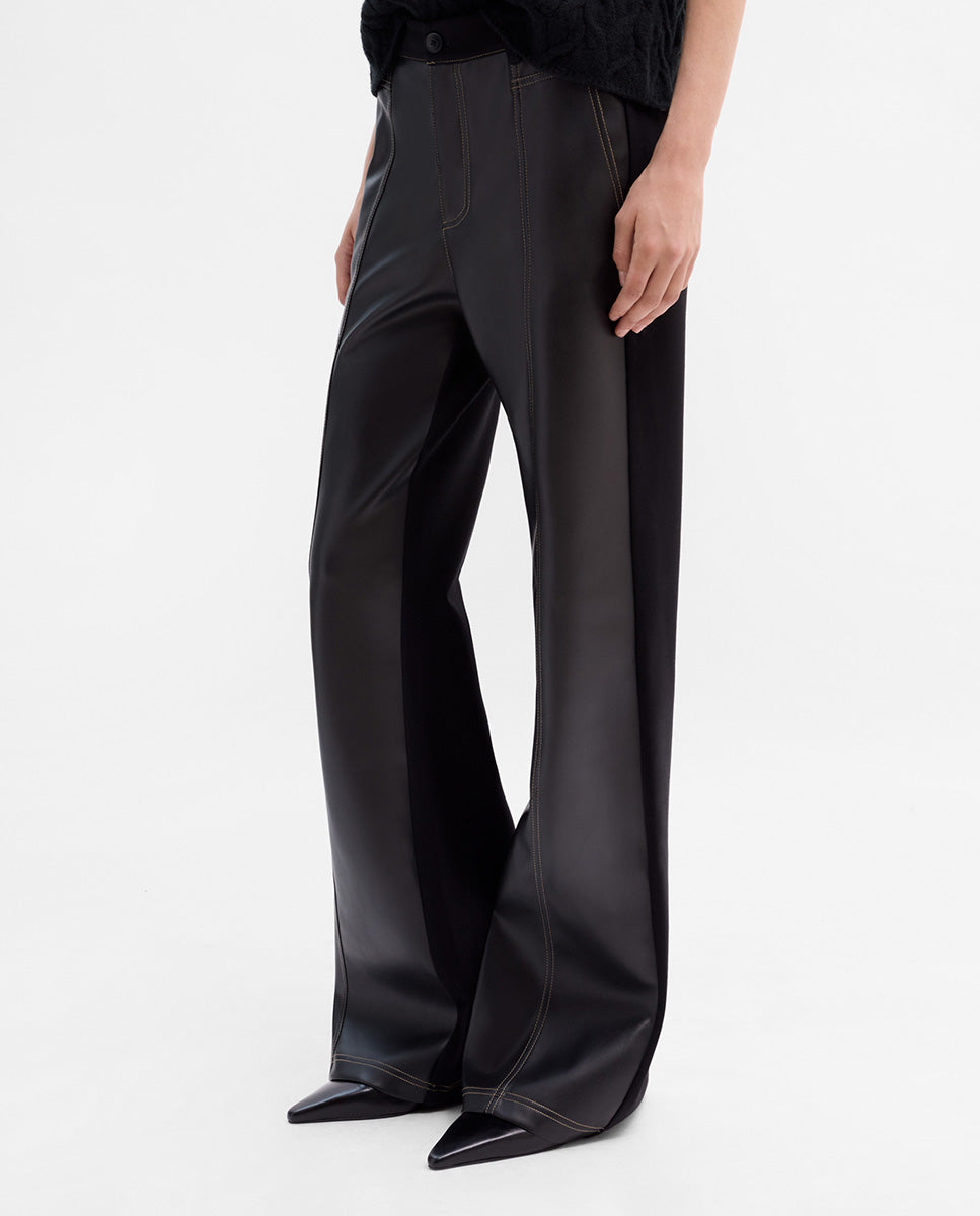 Pantalón bimateria pespuntes