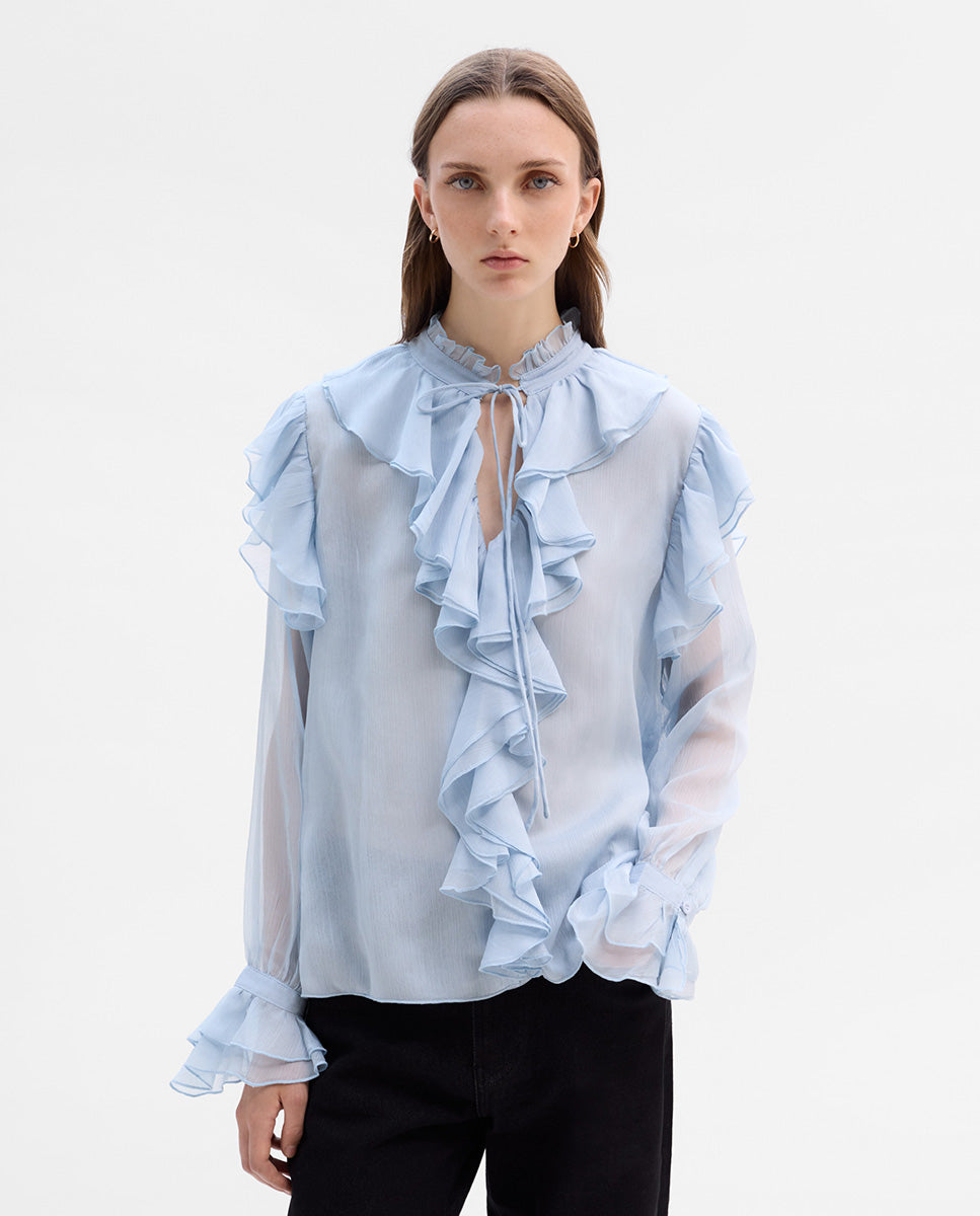 Blusa vaporosa volantes