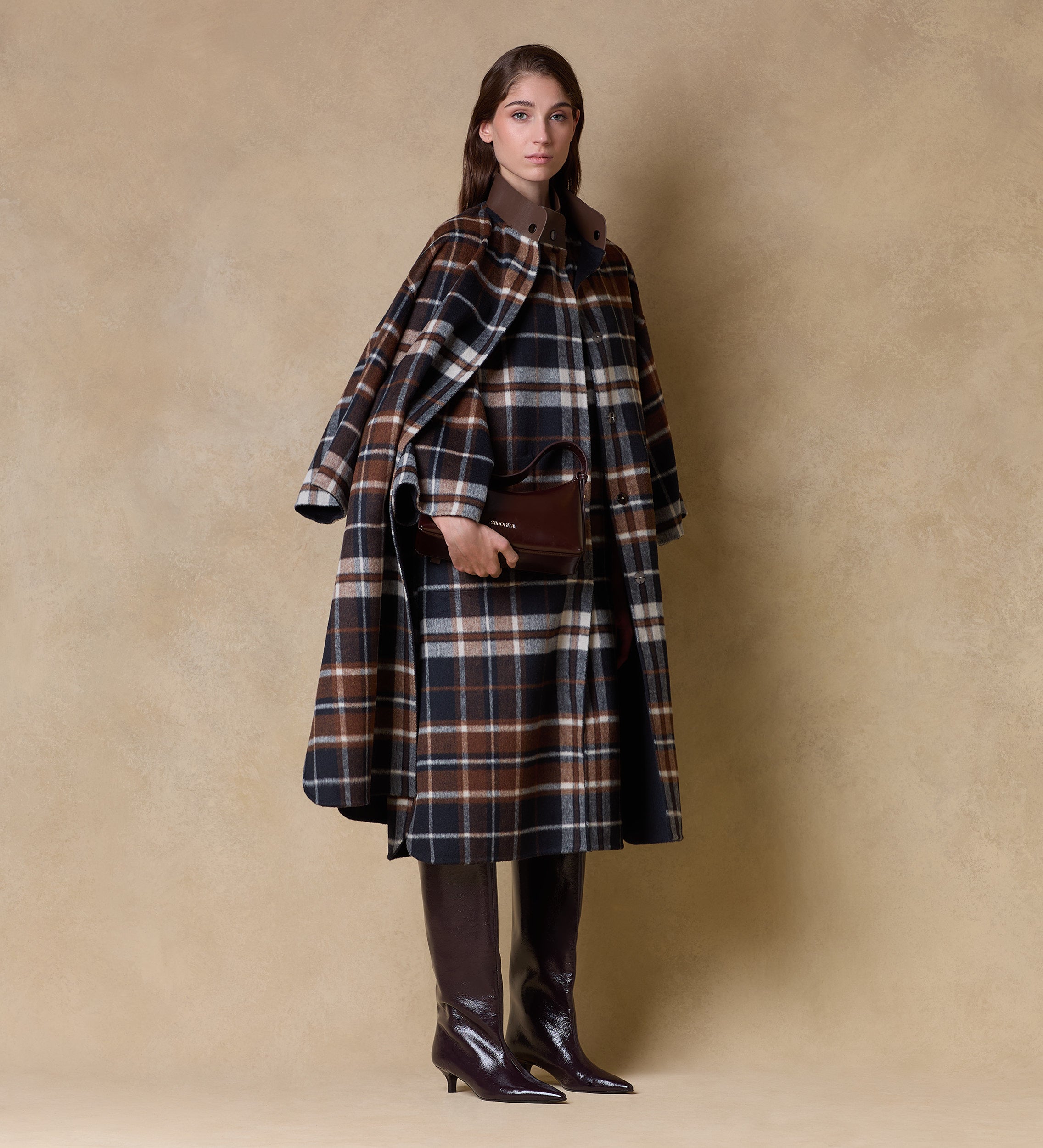 Reversible checkered cape