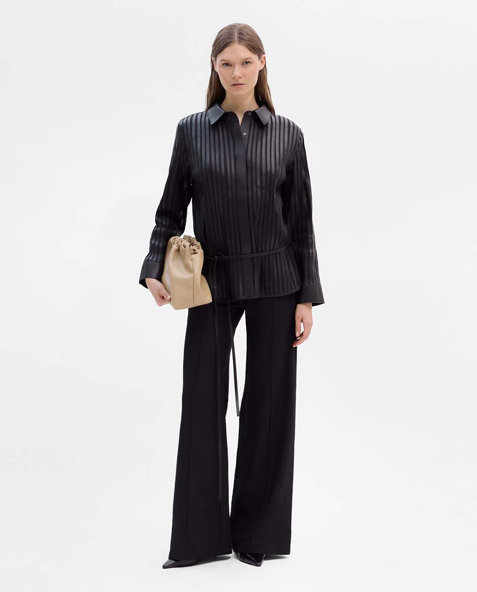 High-waisted flared trousers