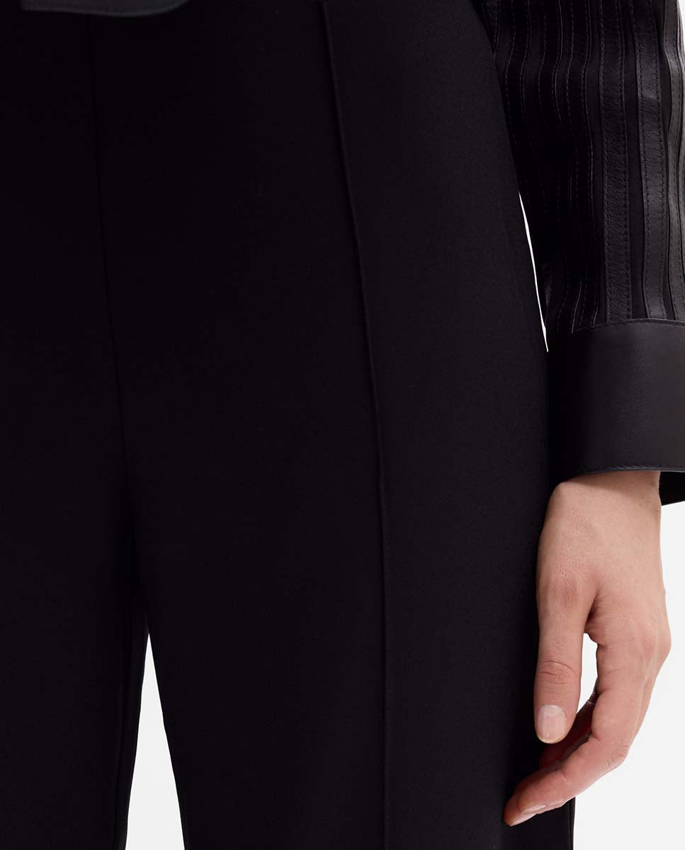 High-waisted flared trousers