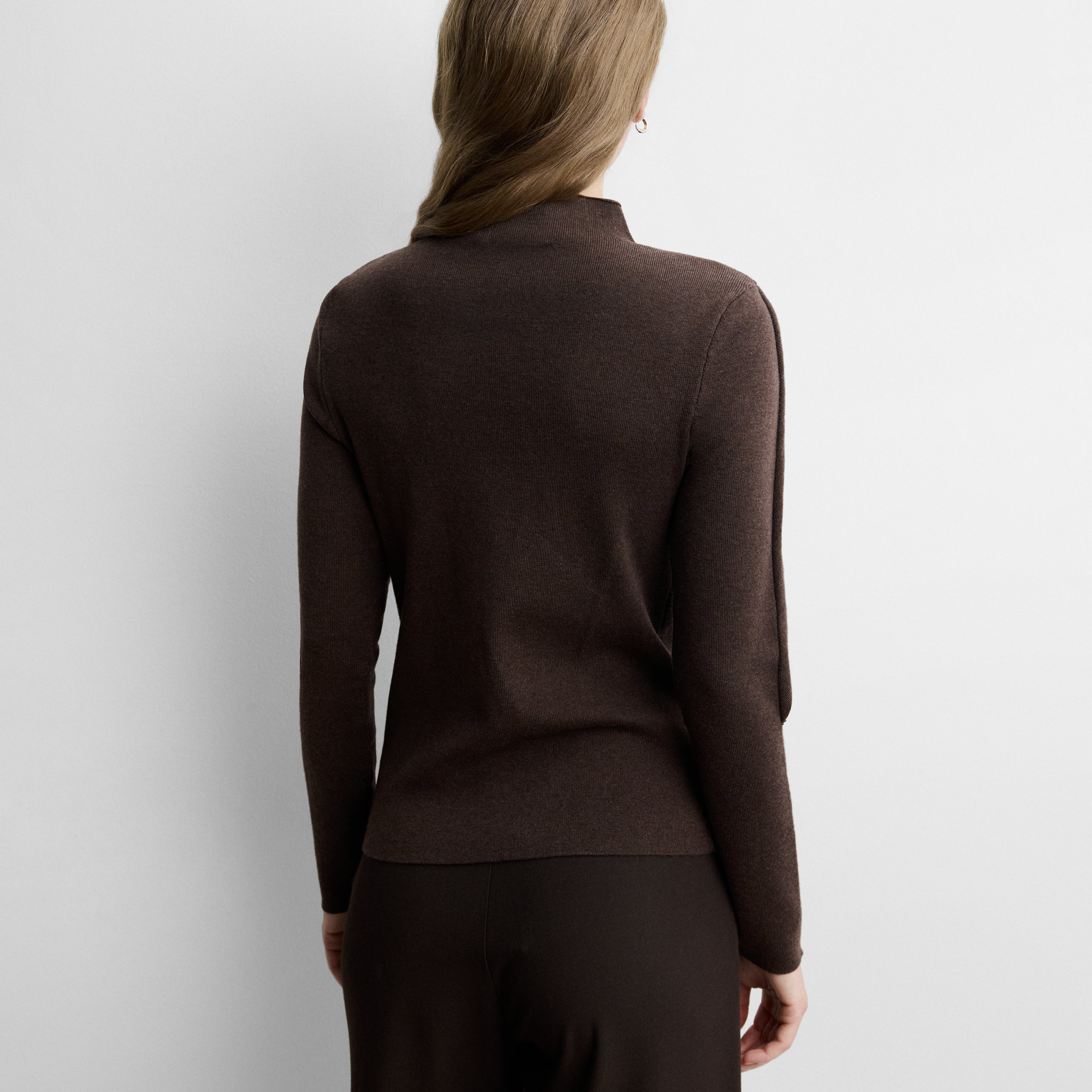 Pull à détail de cape