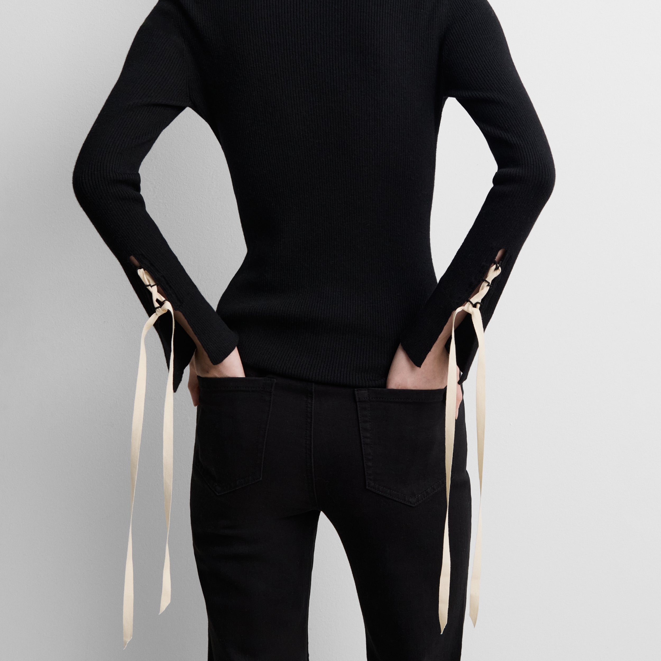 Two-tone ribbed sweater with straps