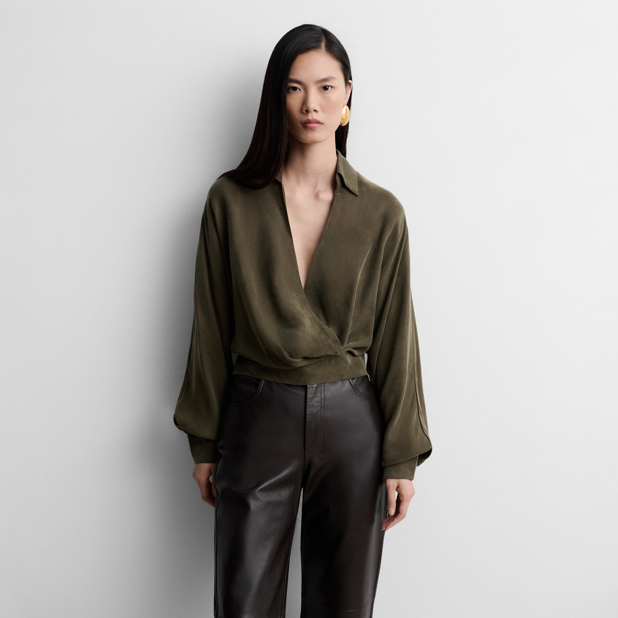Fluid blouse with wrap neckline