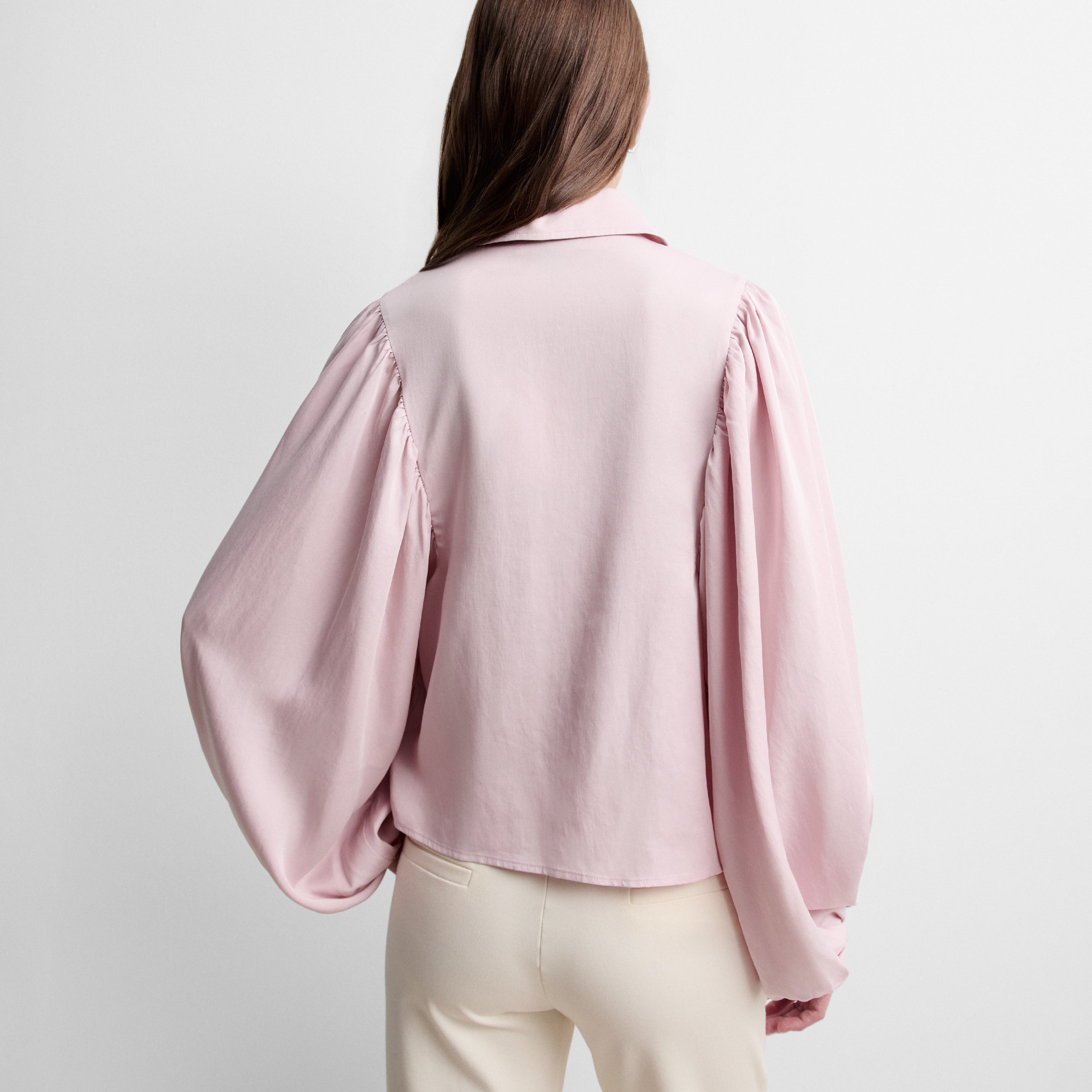 Blouse à fermeture éclair et manches bouffantes
