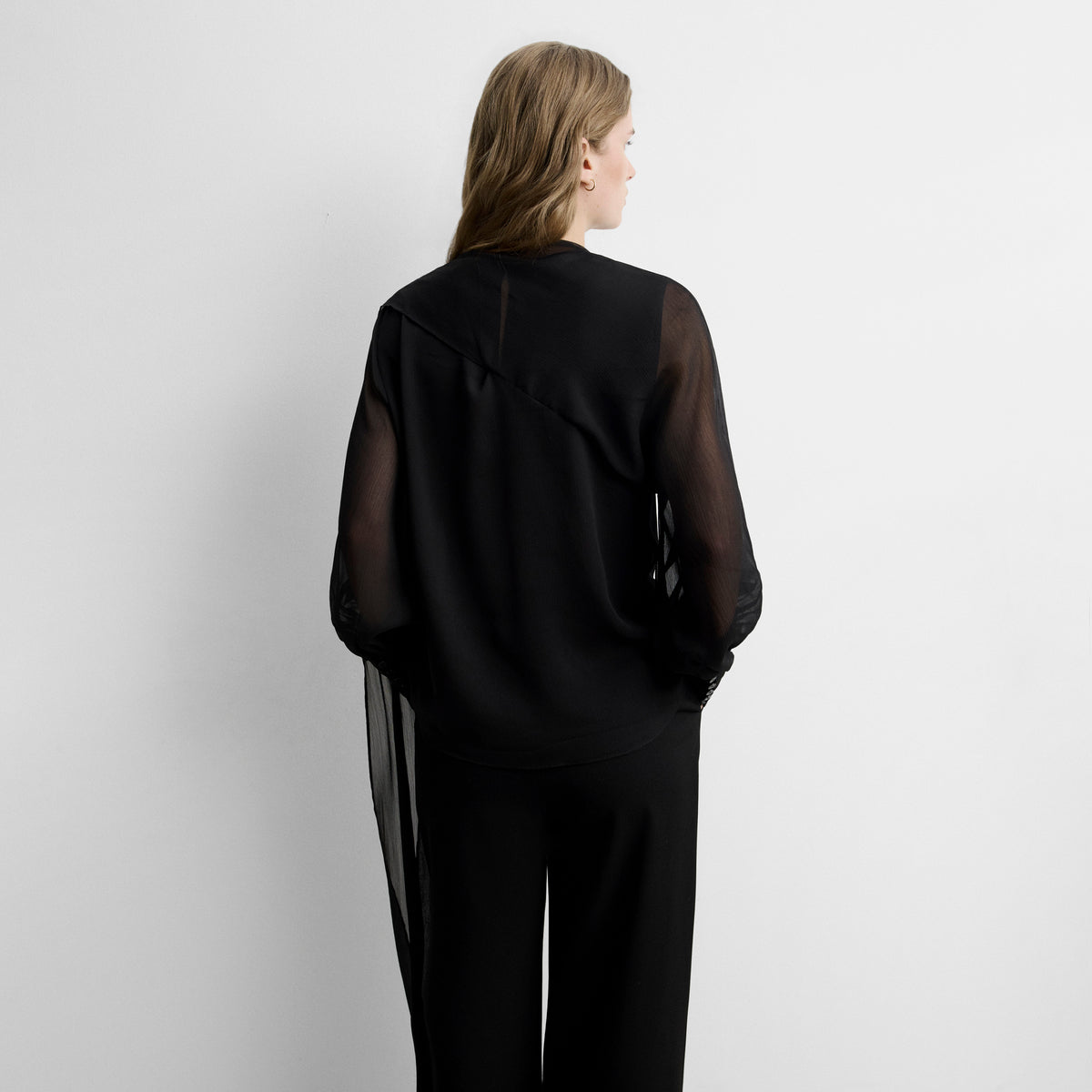 Flowy handkerchief-hem blouse