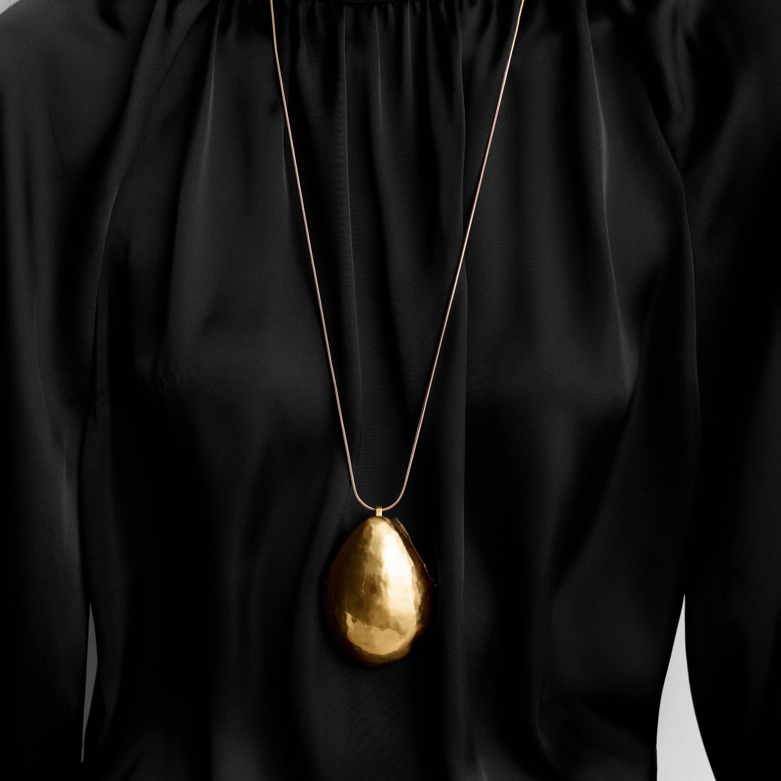Gold-tone locket necklace