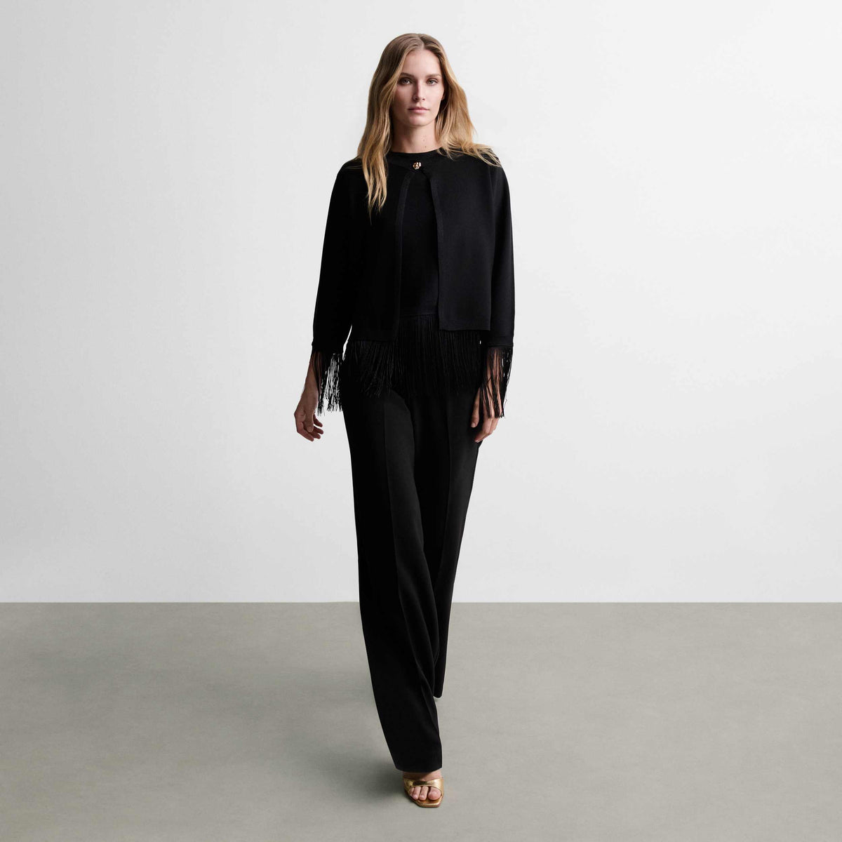 Bolero punto lurex flecos
