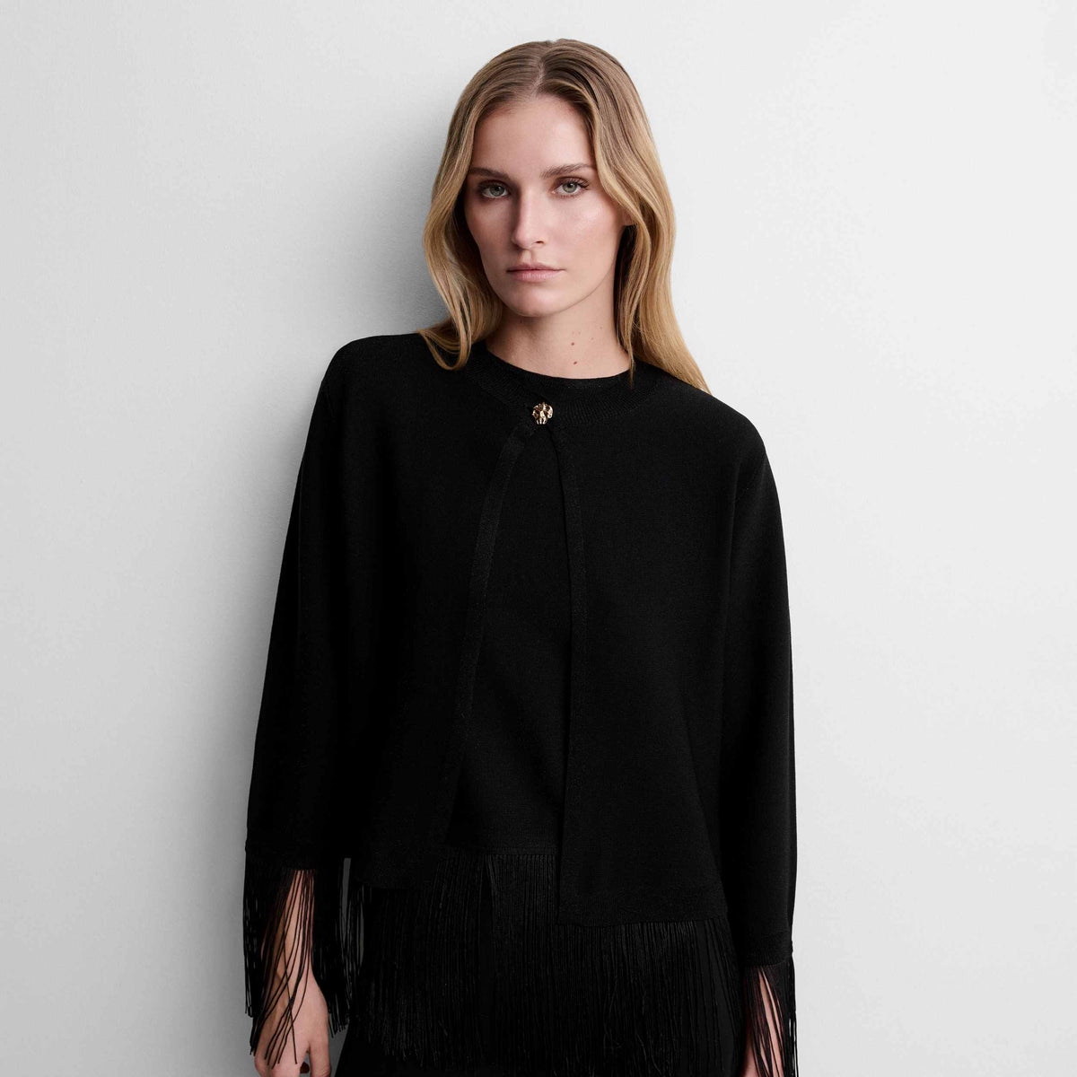 Bolero punto lurex flecos
