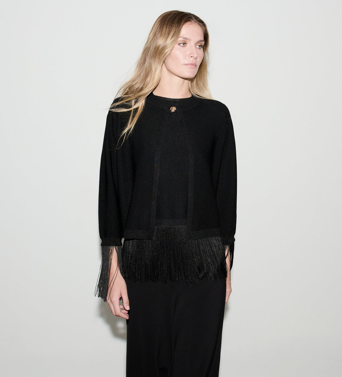 Bolero punto lurex flecos