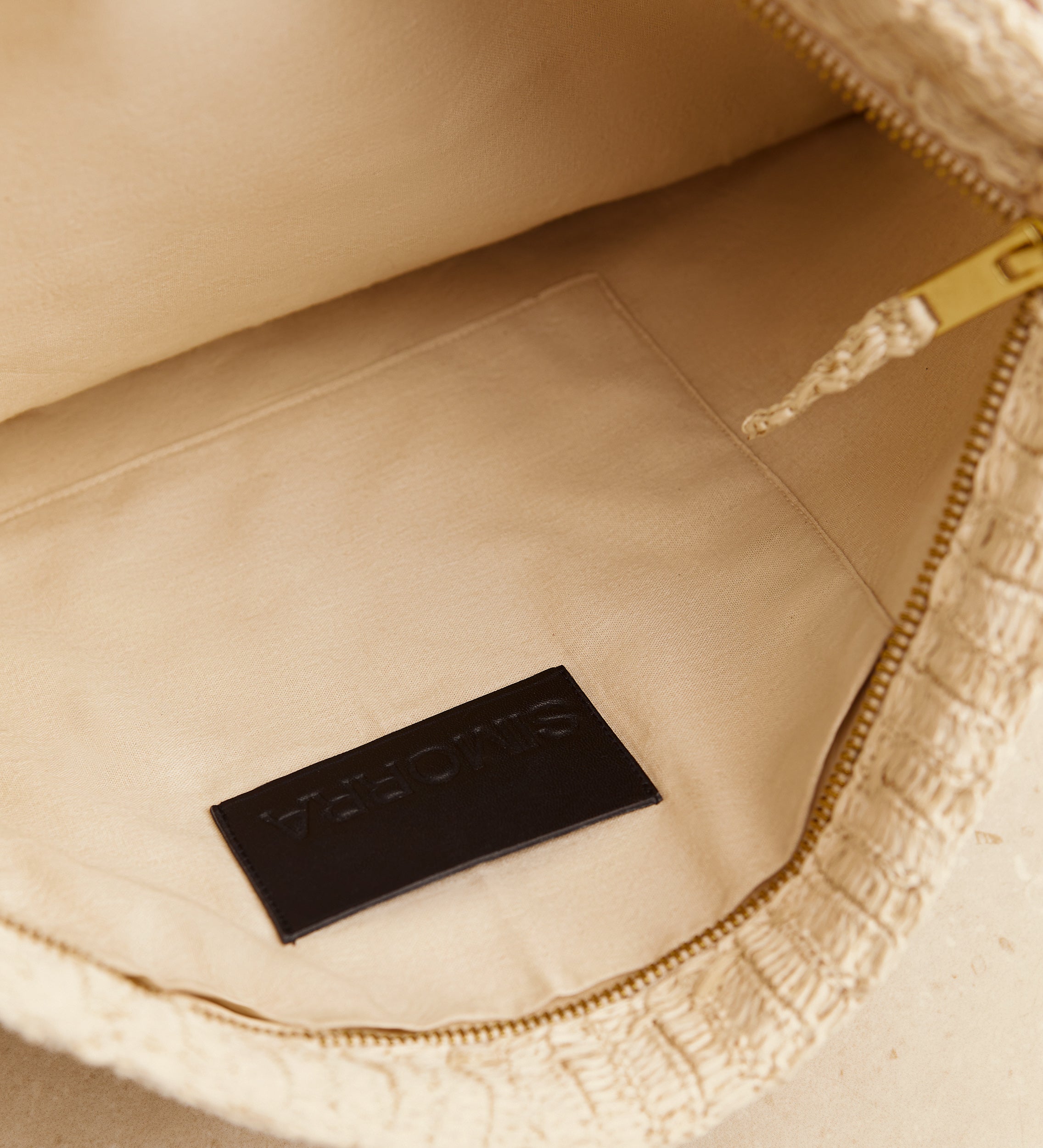 Bolso shantung trenzado