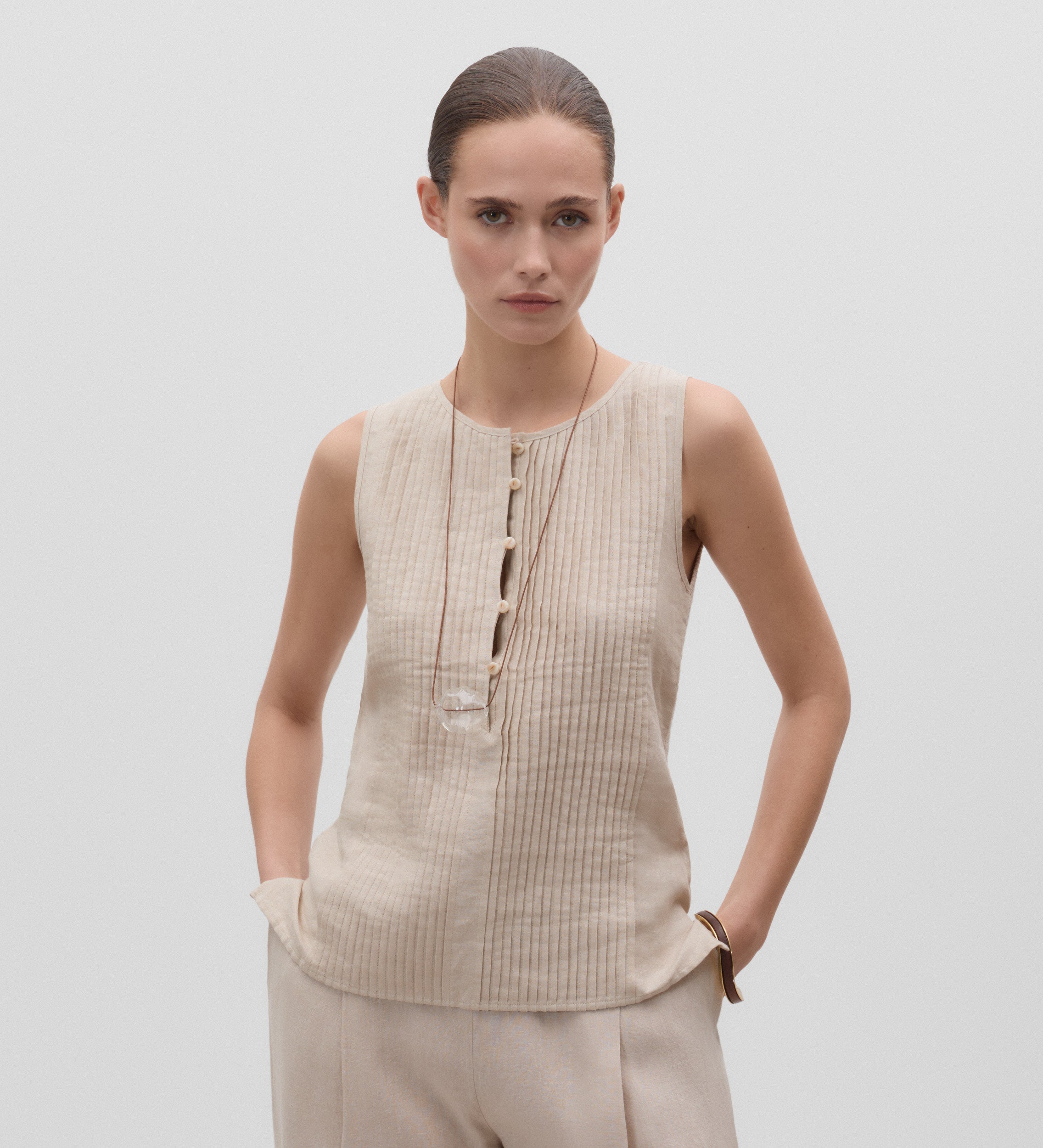 Top combinado pliegues