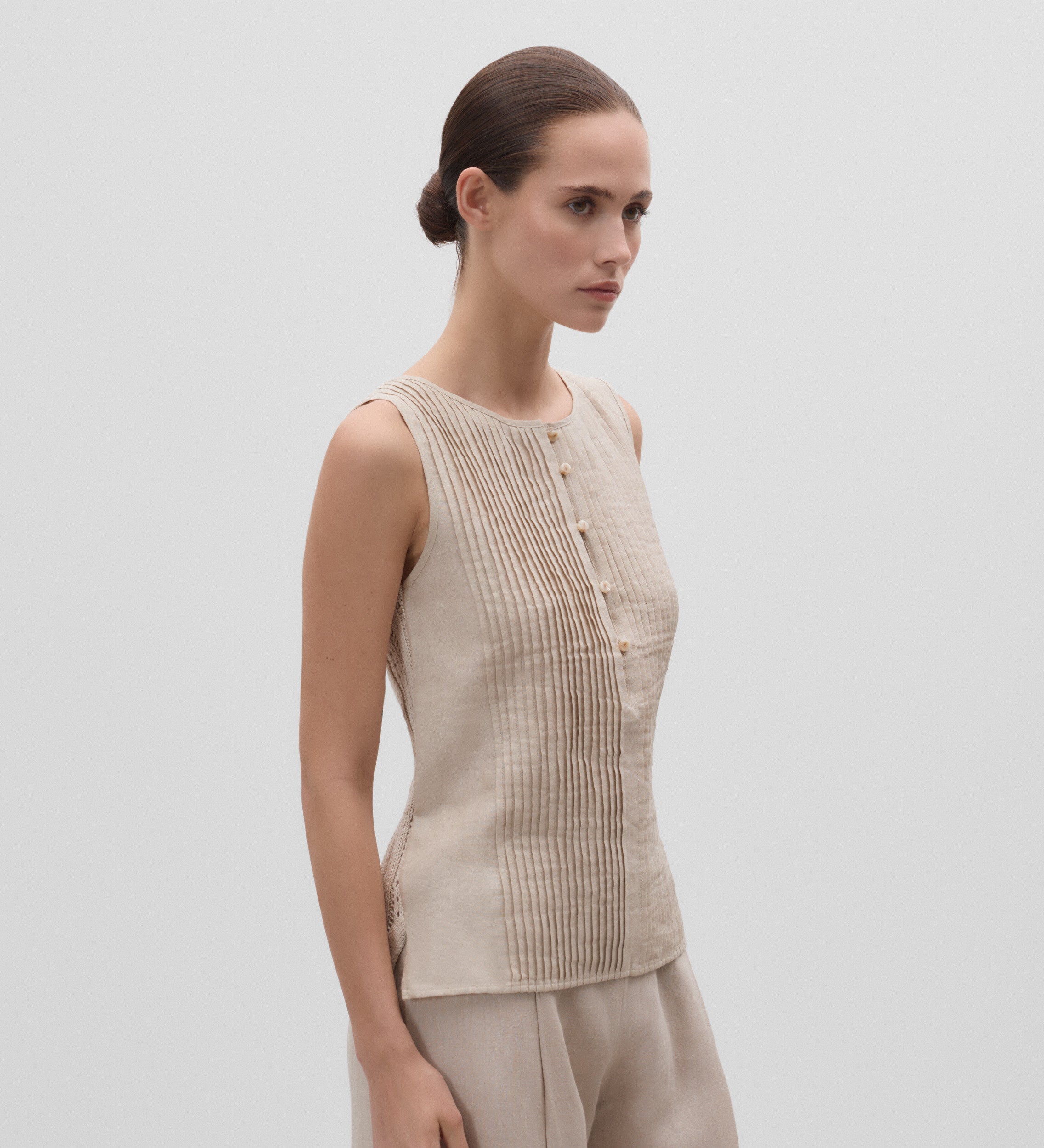 Top combinado pliegues