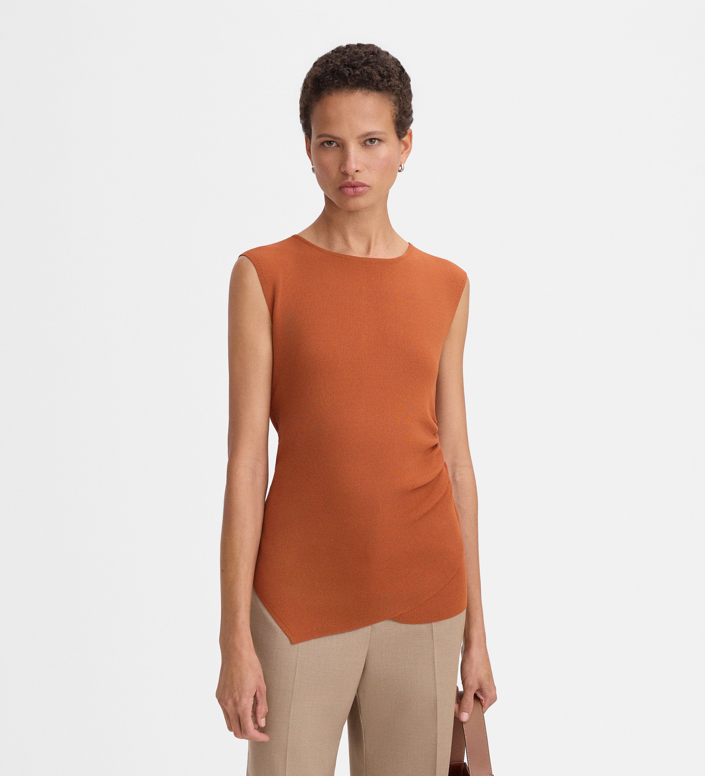 Top punto asimétrico