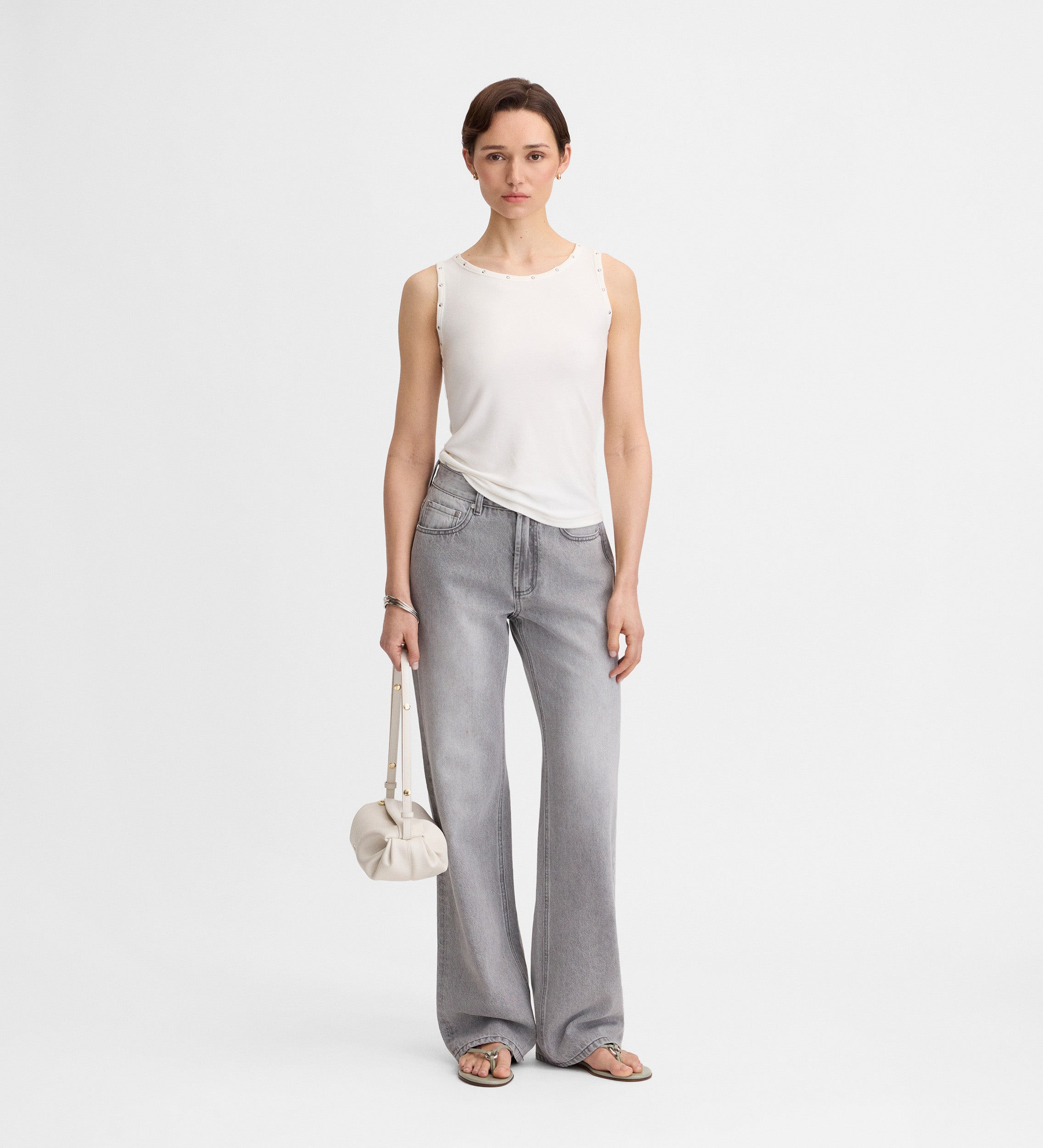 Sleeveless t-shirt with rivets