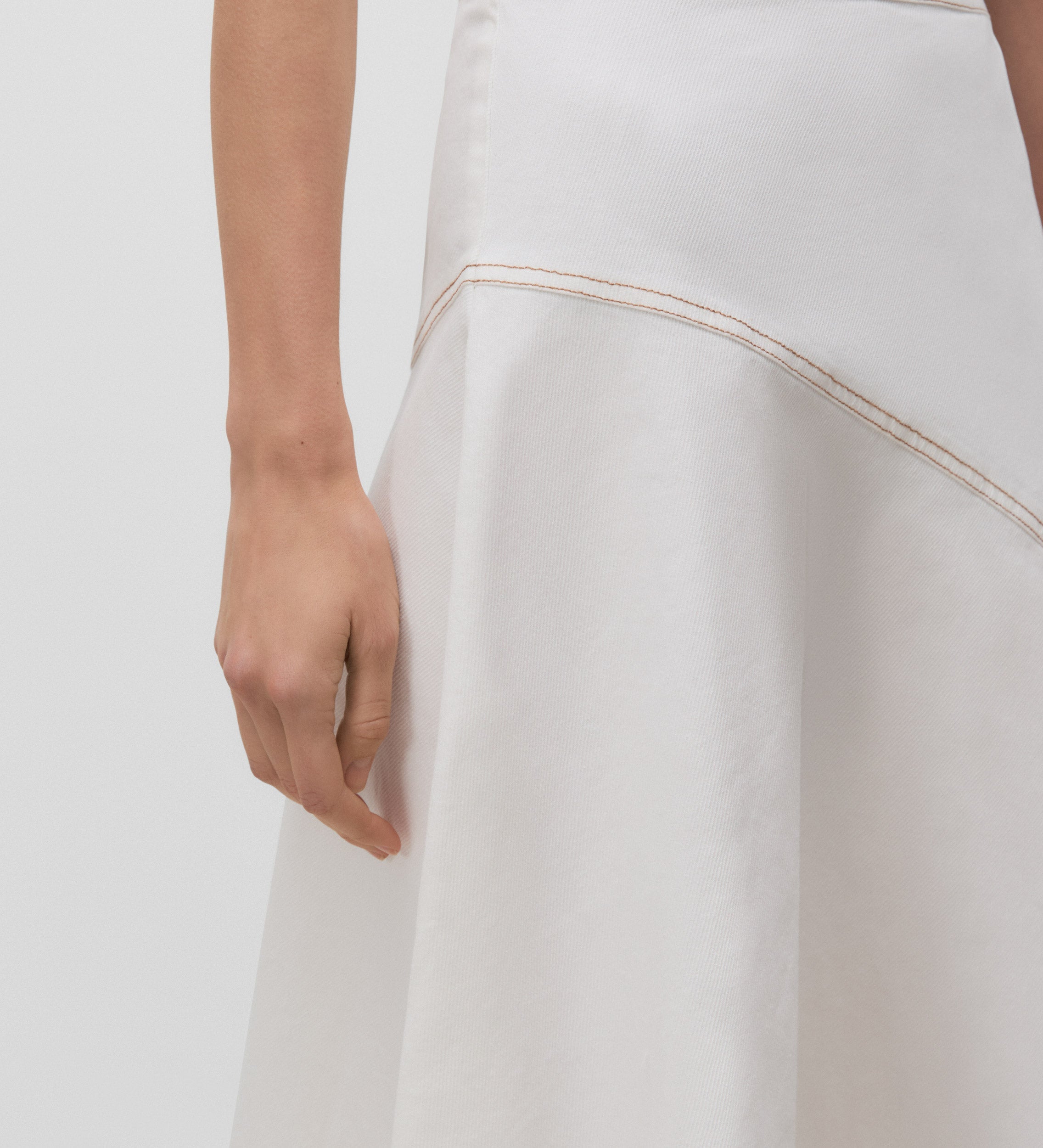 Asymmetrical skirt with contrast stitching