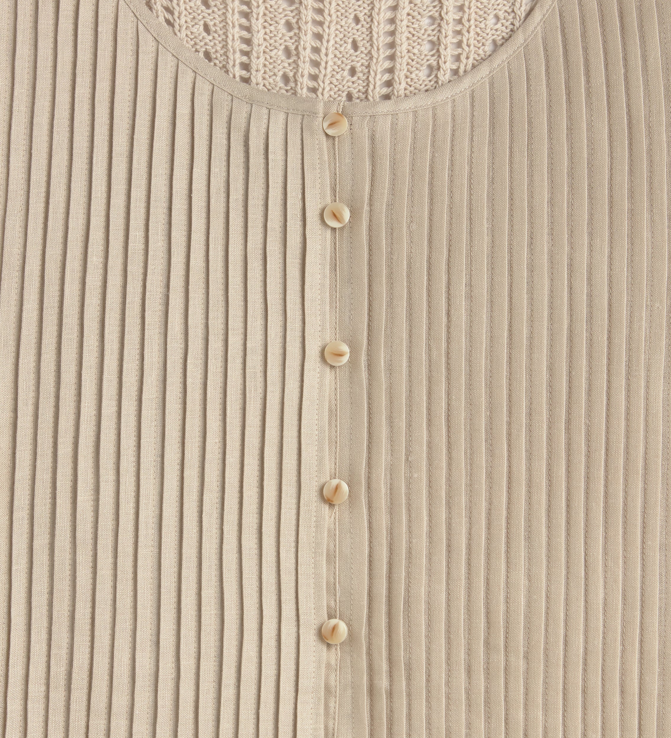 Top combinado pliegues