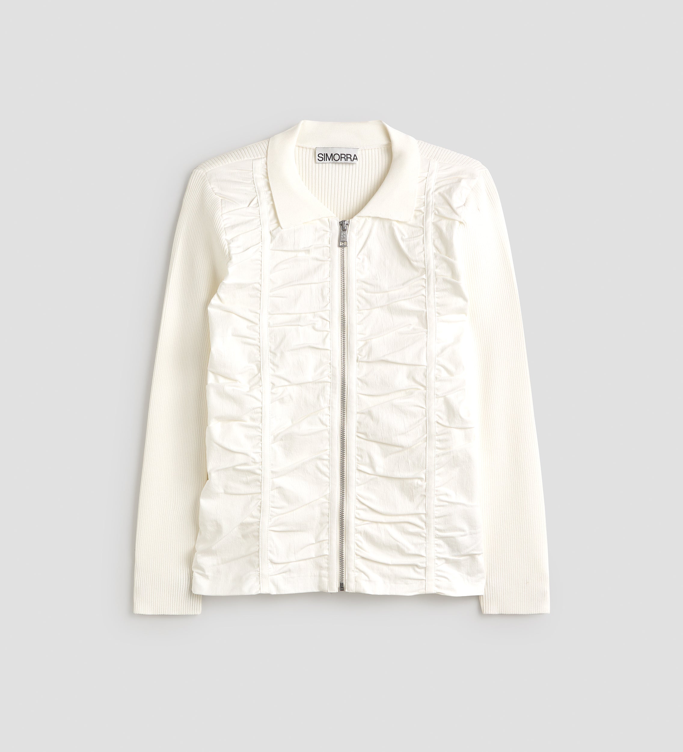 Bi-material knitted jacket