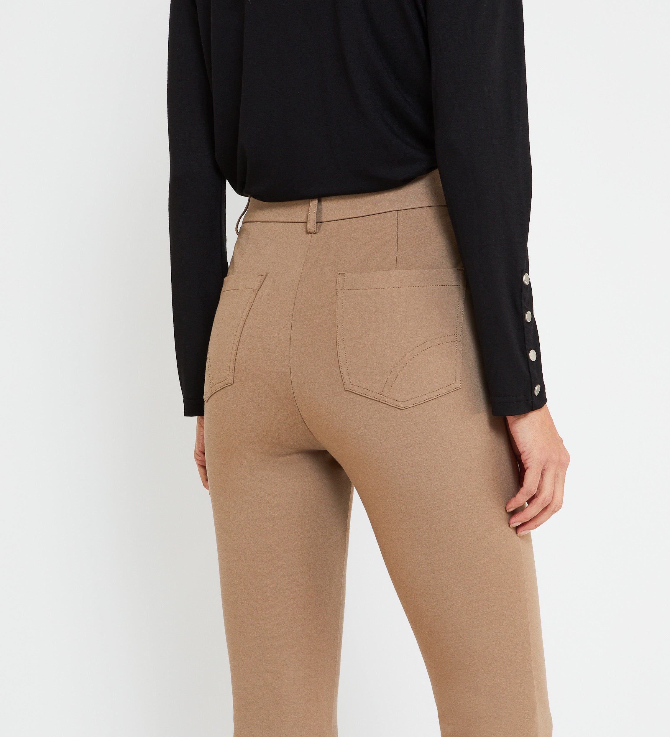 Flared elastic trousers