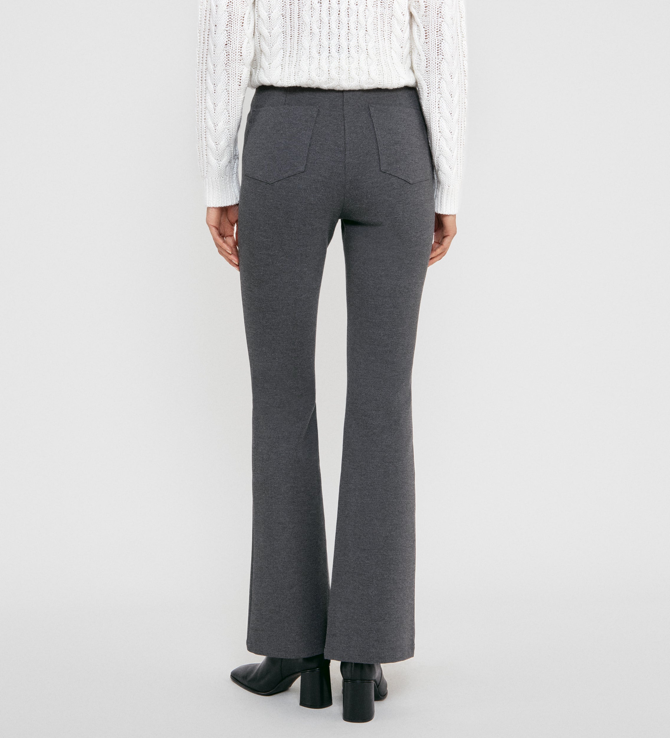 Flared elastic trousers