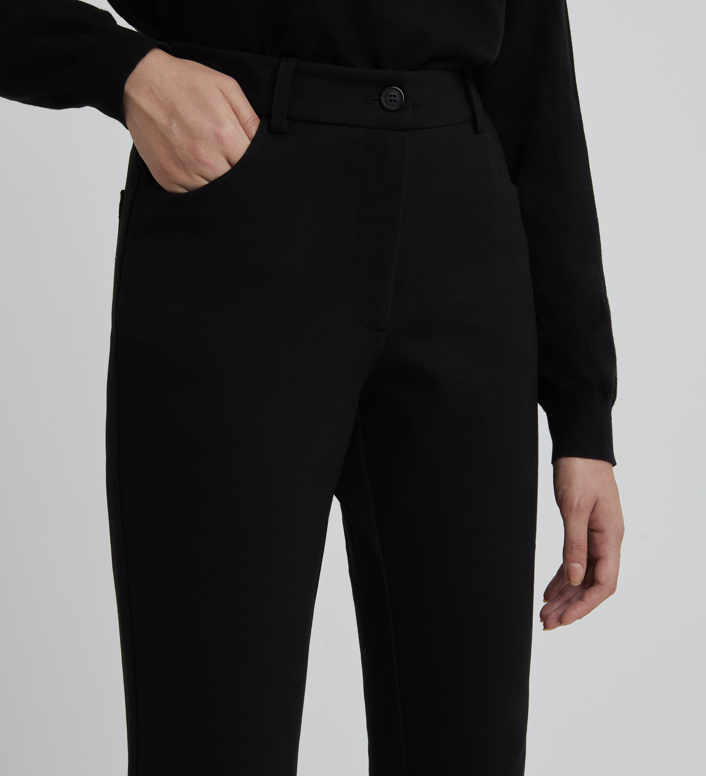 Flared elastic trousers