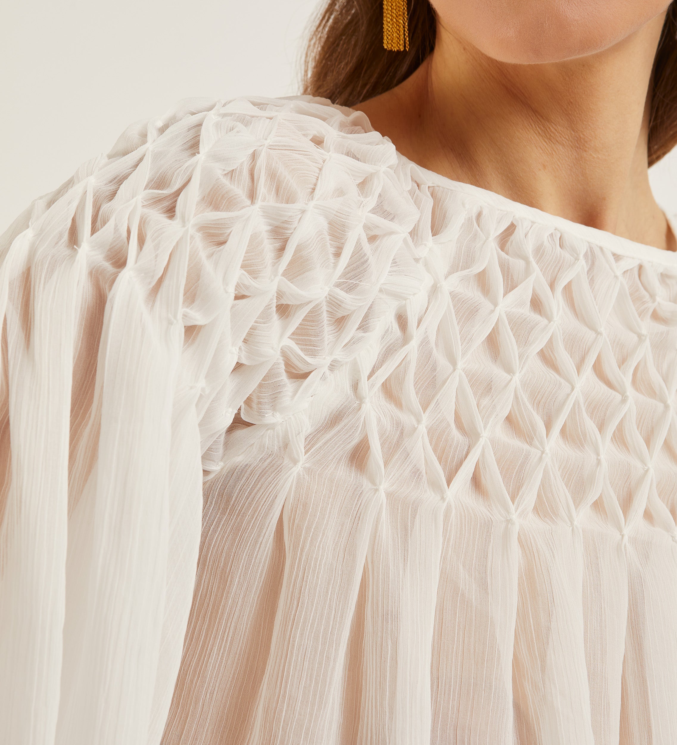 Blouse en maille smockée