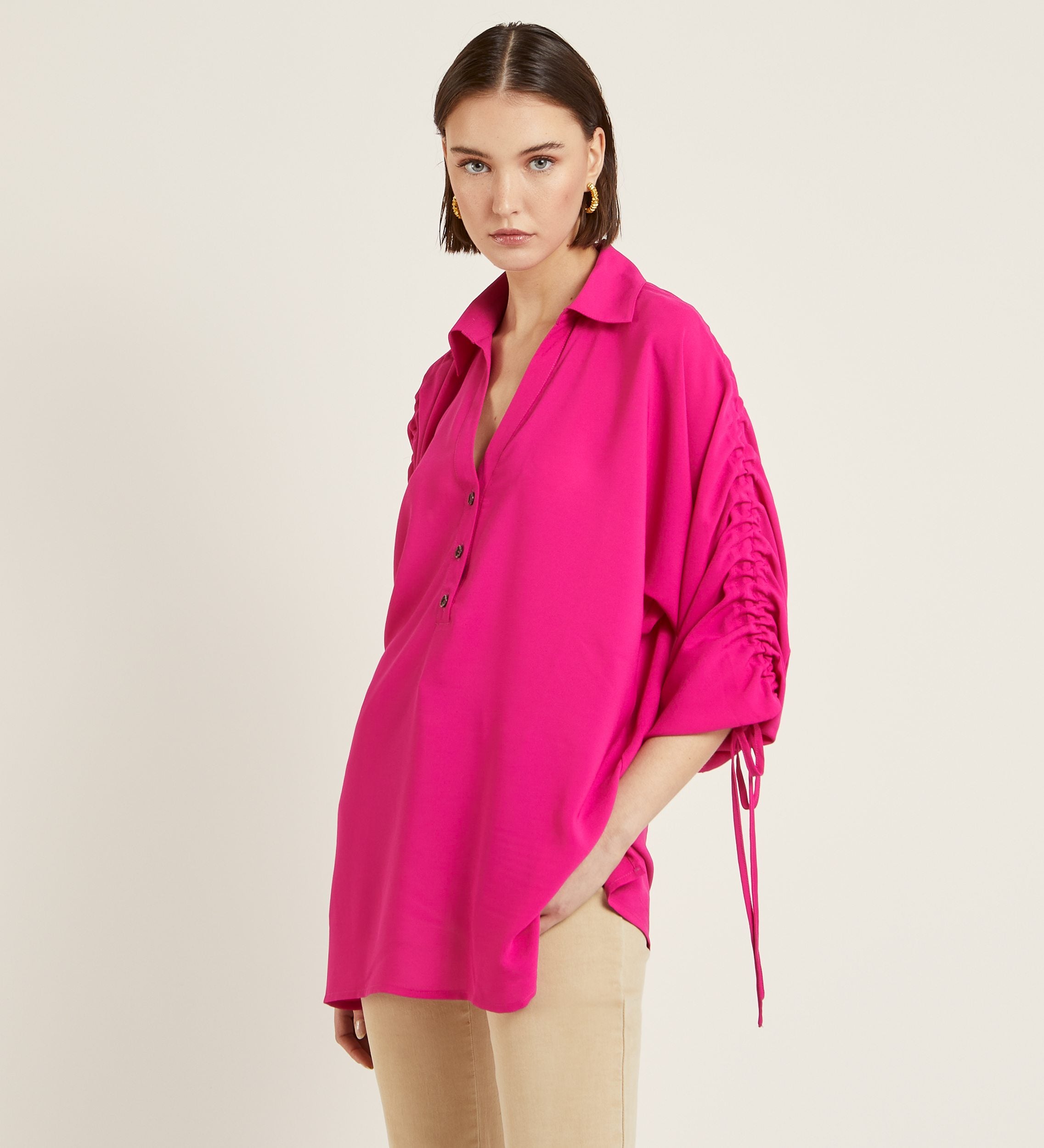 Blusón mangas volumen