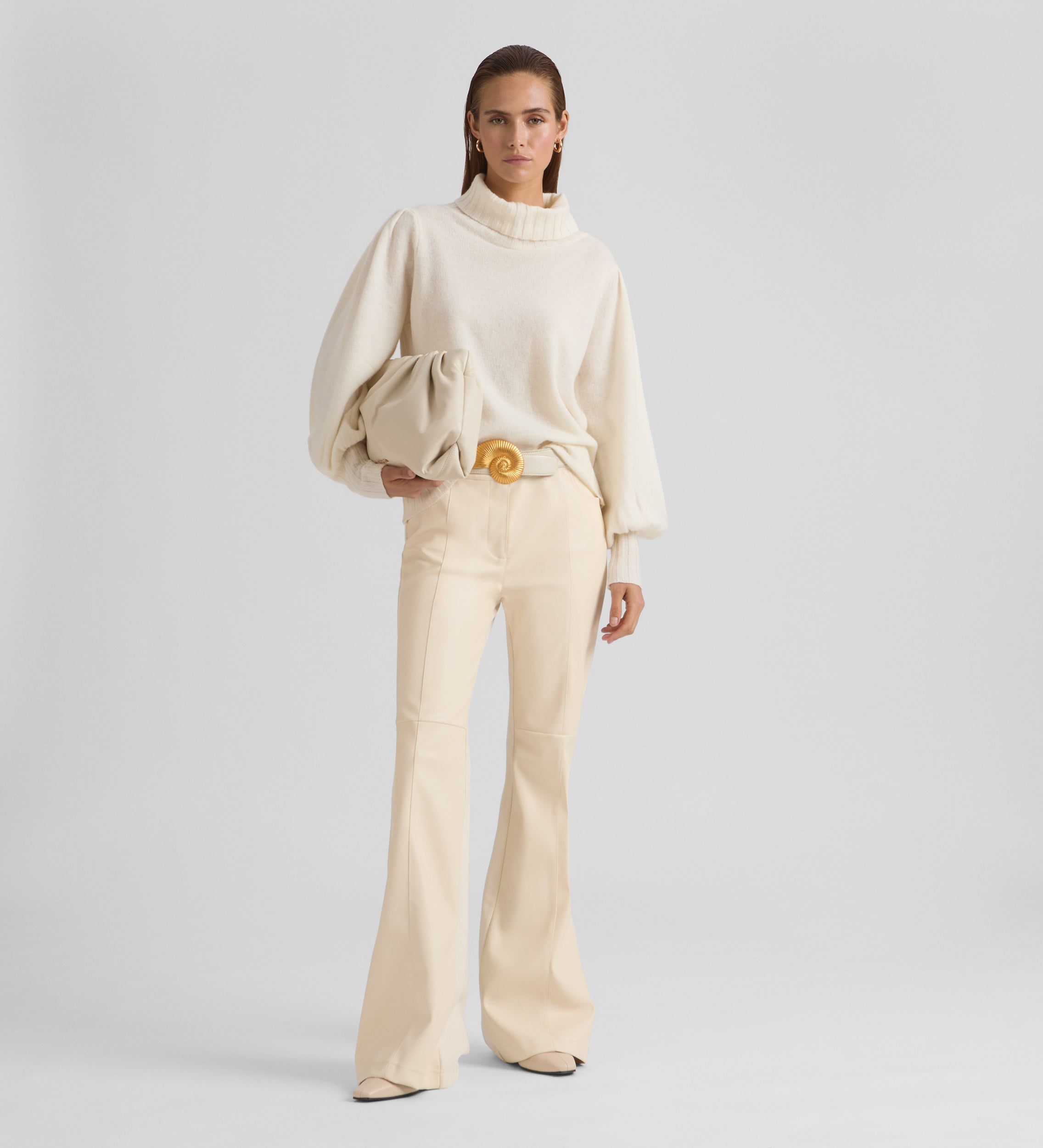 Bell-bottom bi-material trousers