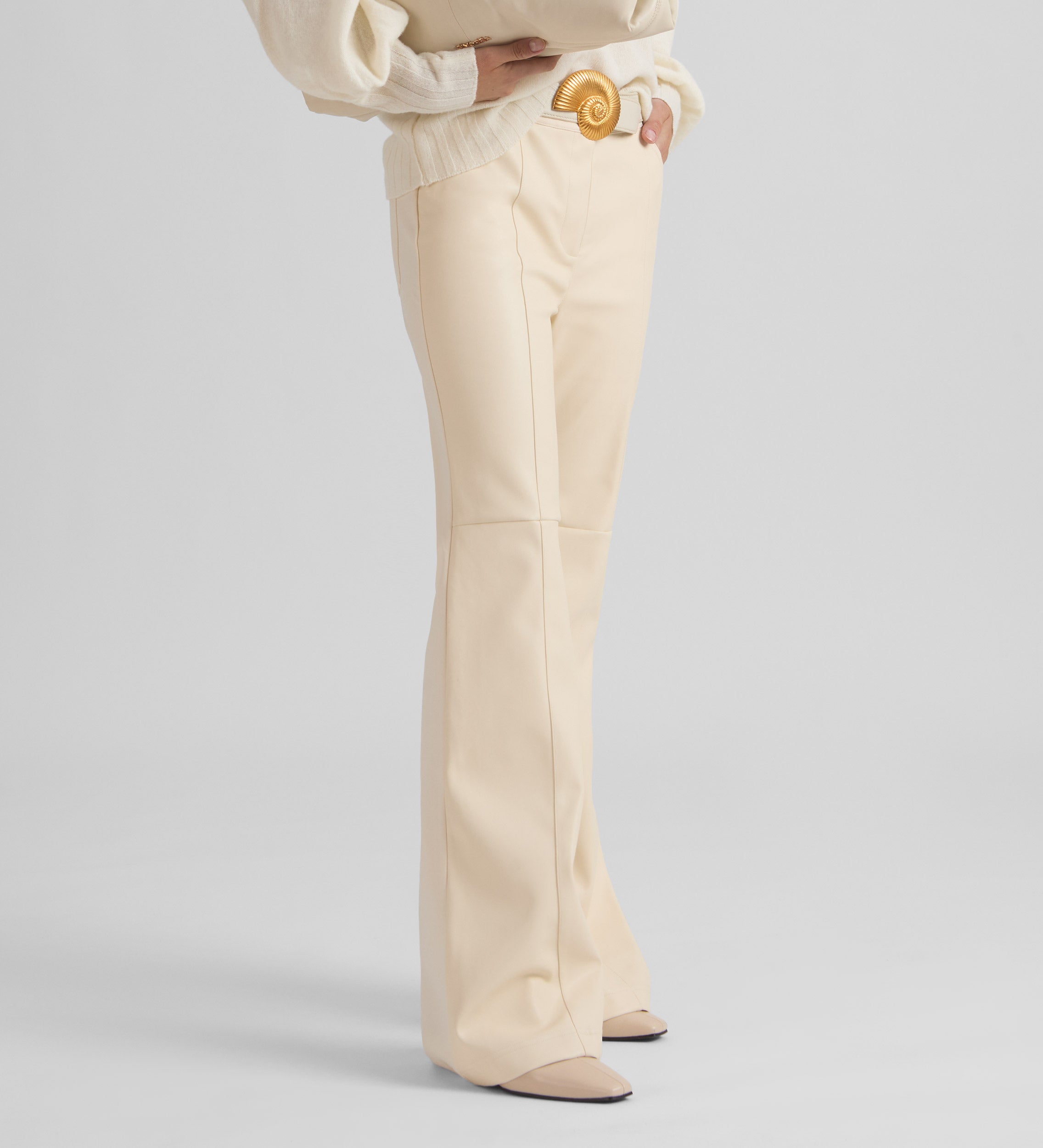 Bell-bottom bi-material trousers