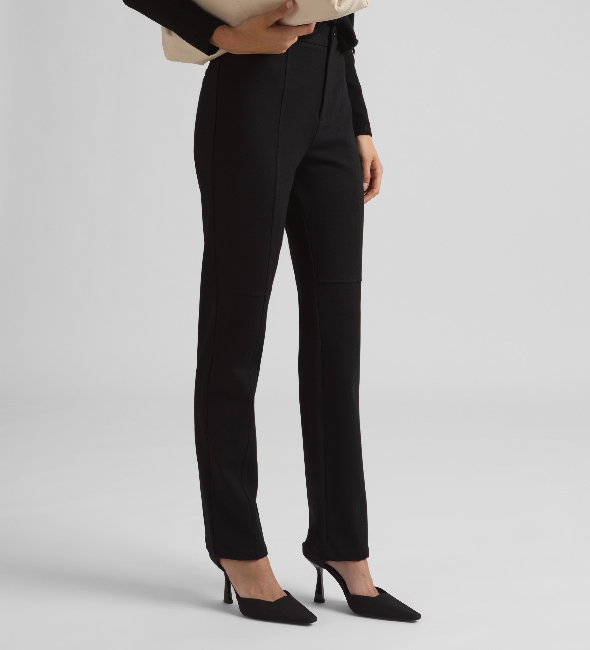 Straight elastic trousers with cuts