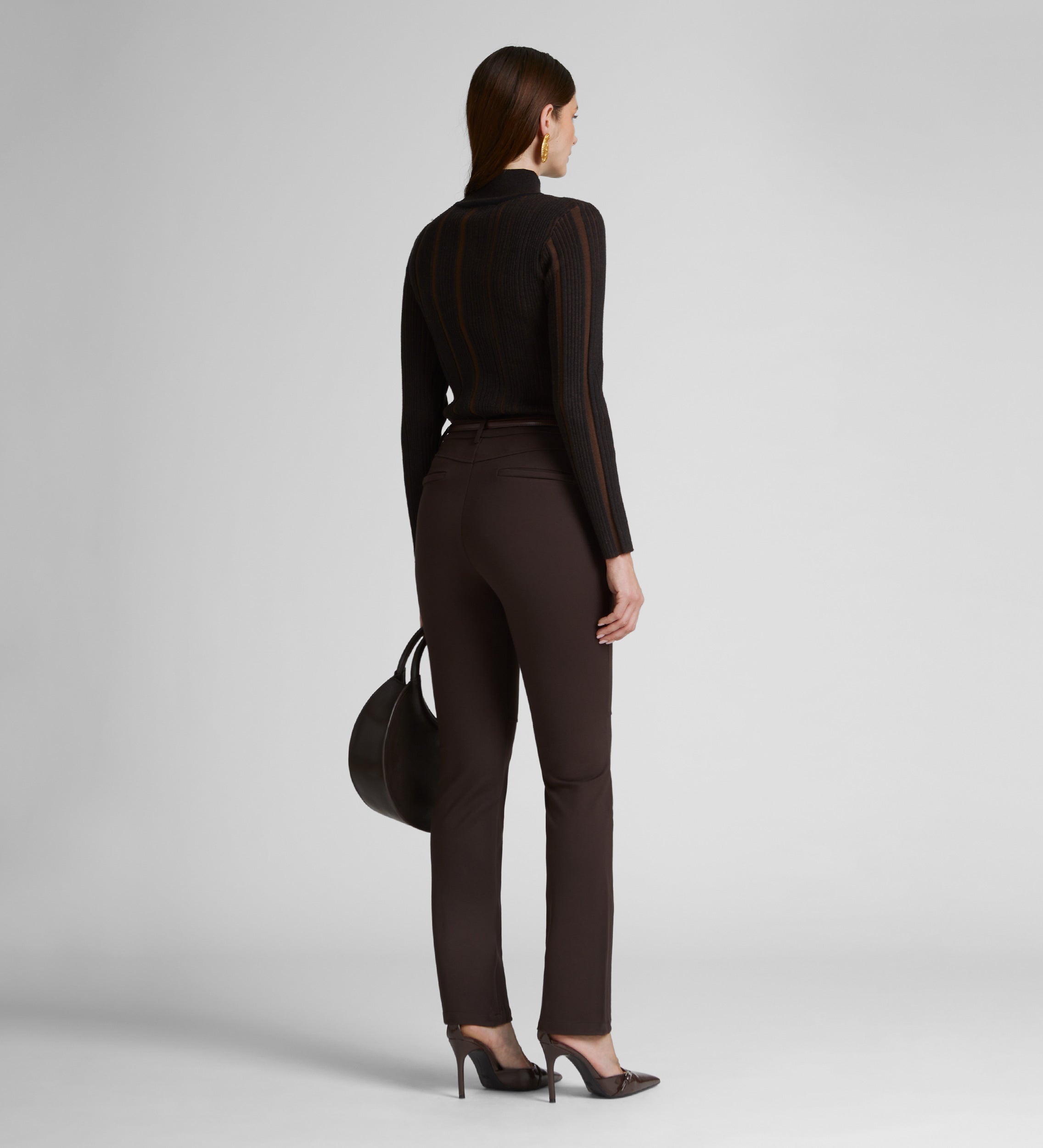 Straight elastic trousers with cuts