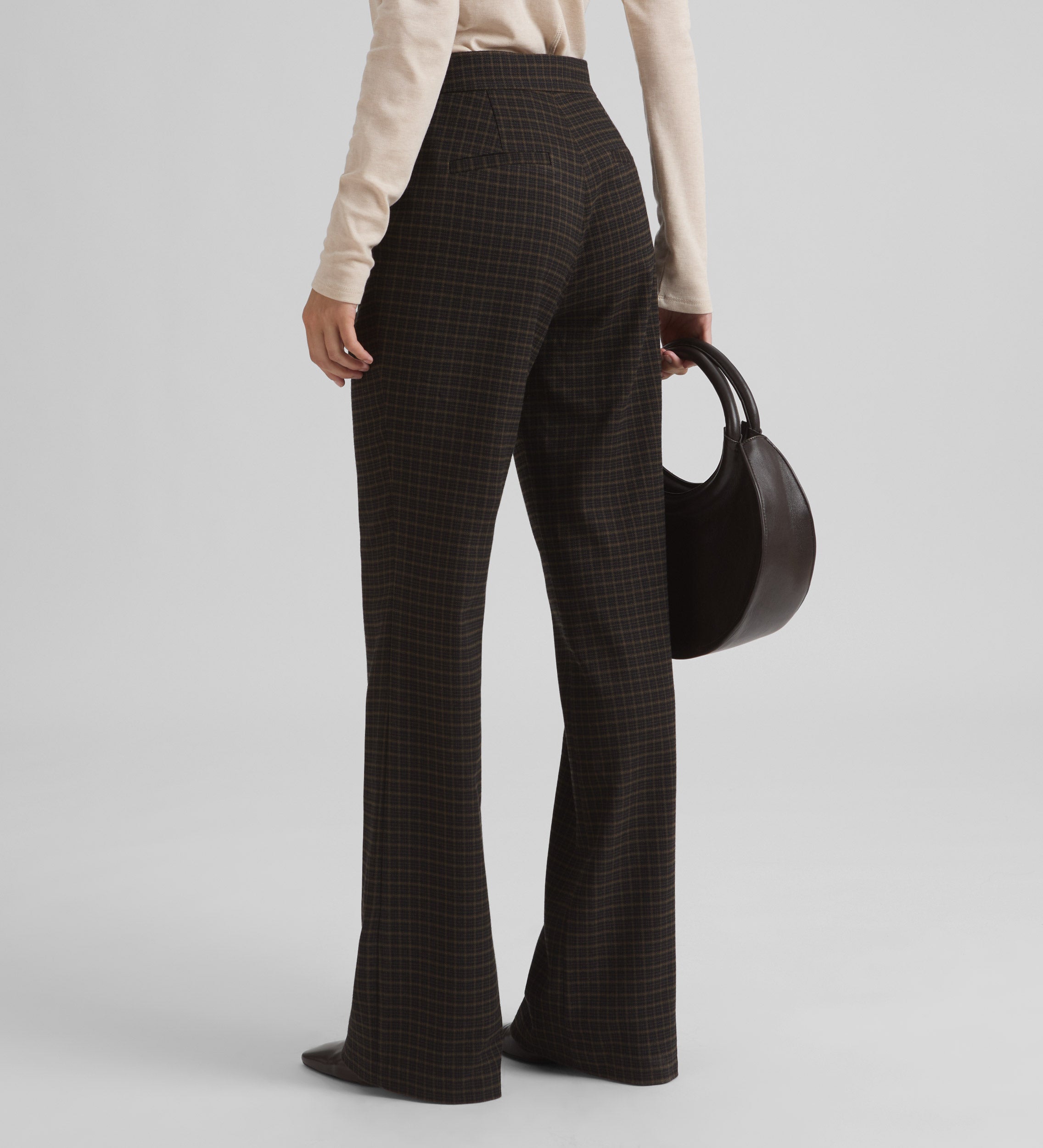 Flared elastic plaid trousers