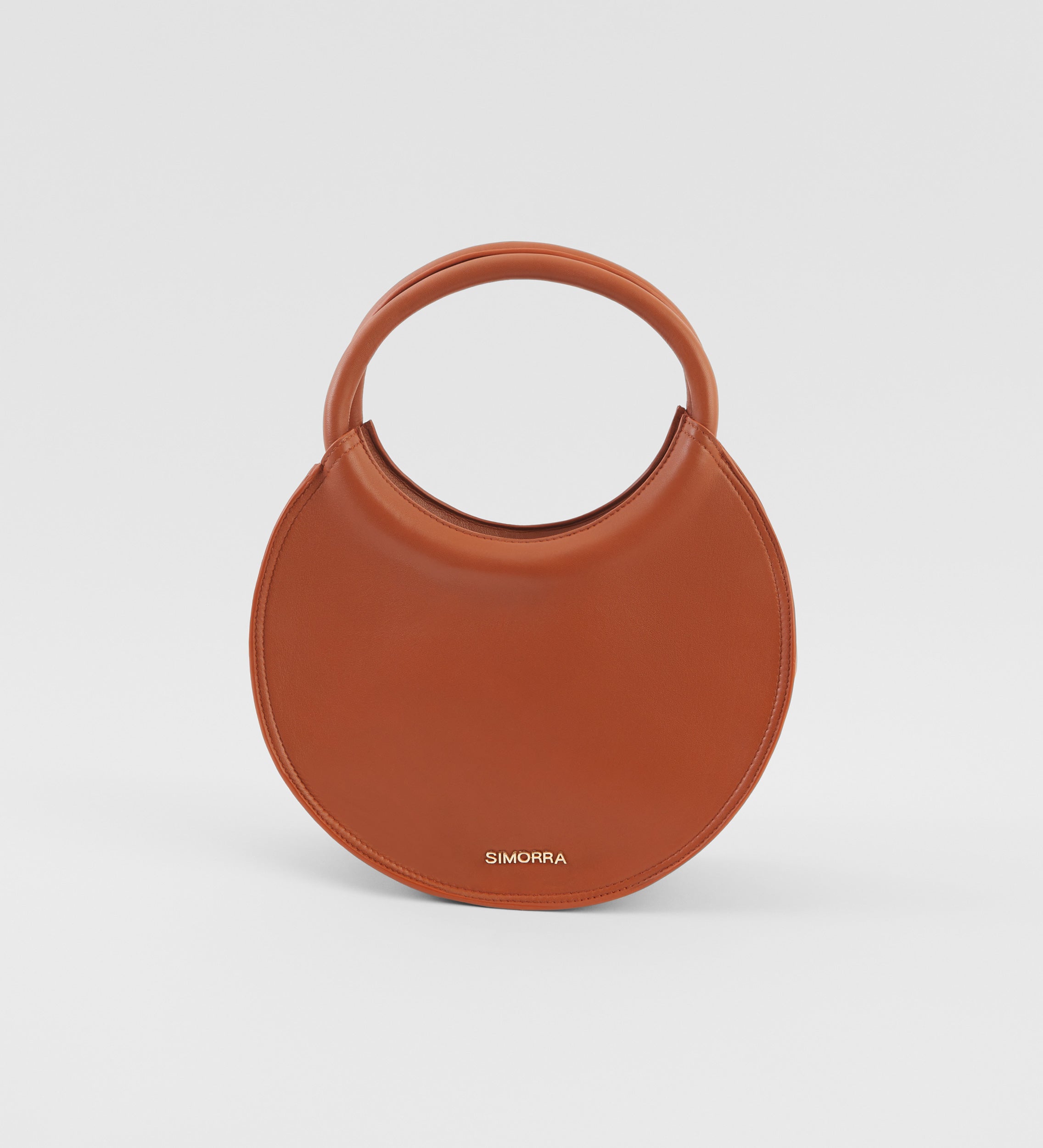 Bolso circular piel