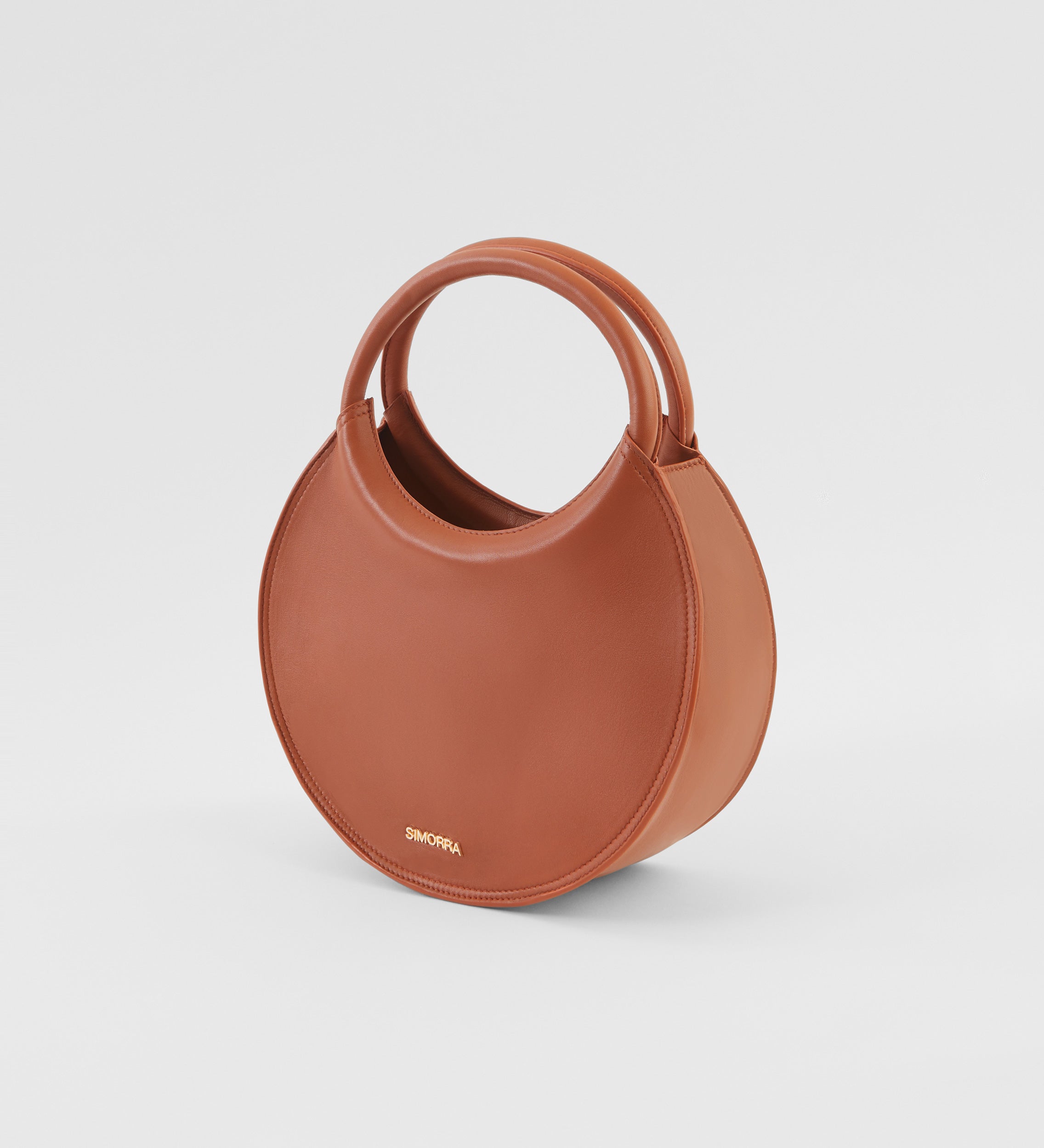 Circular leather bag