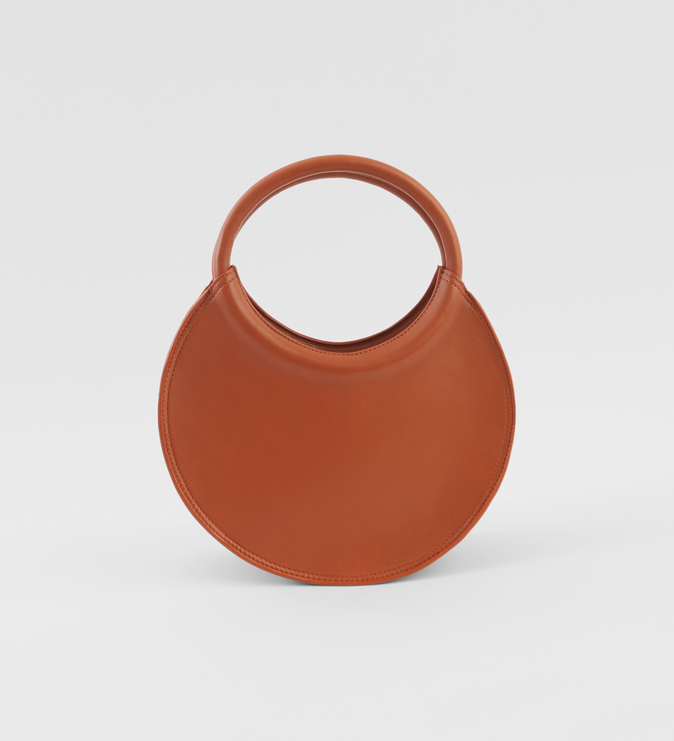 Circular leather bag